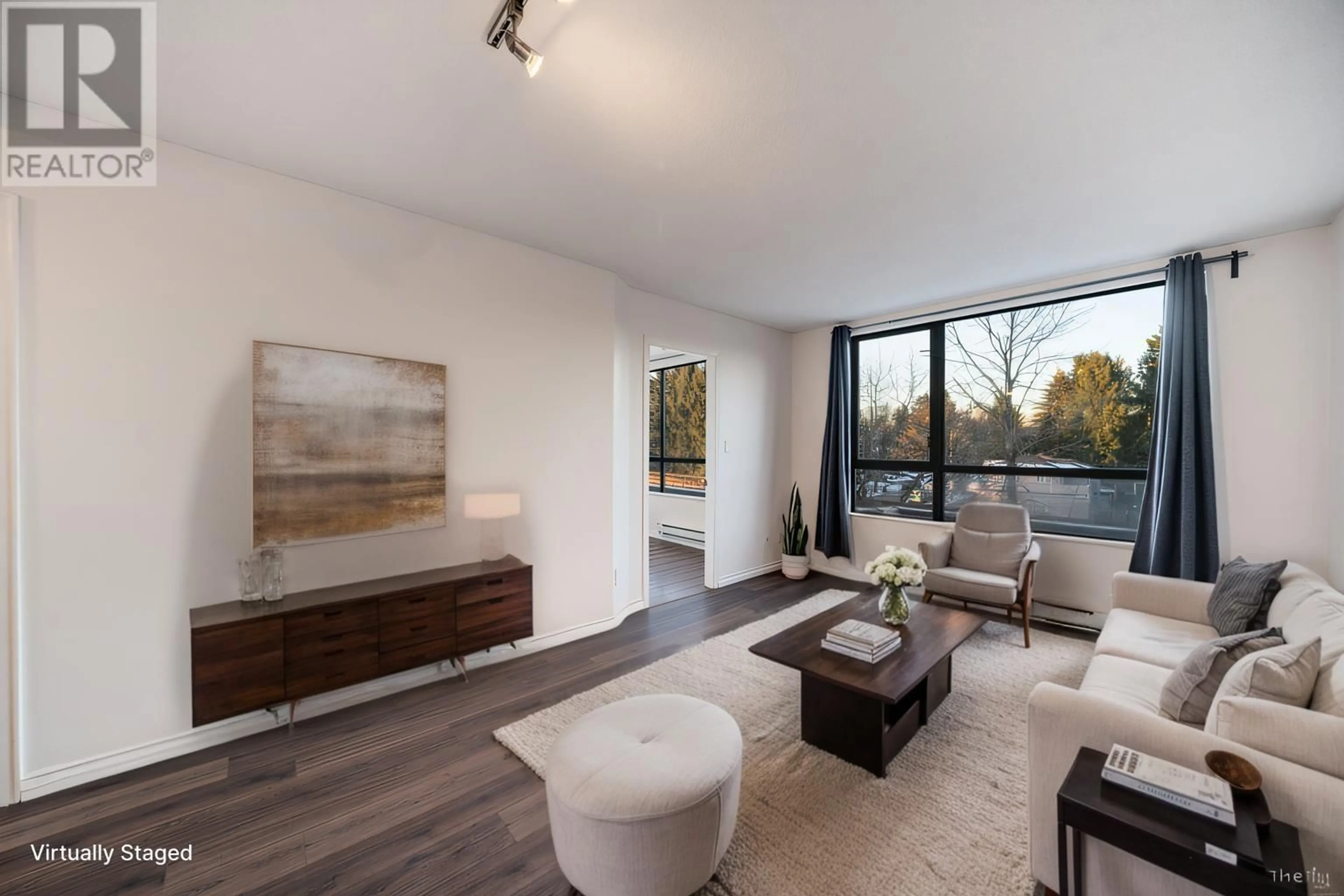 Living room with furniture, wood/laminate floor for 509 - 5288 MELBOURNE STREET, Vancouver British Columbia V5R6E6