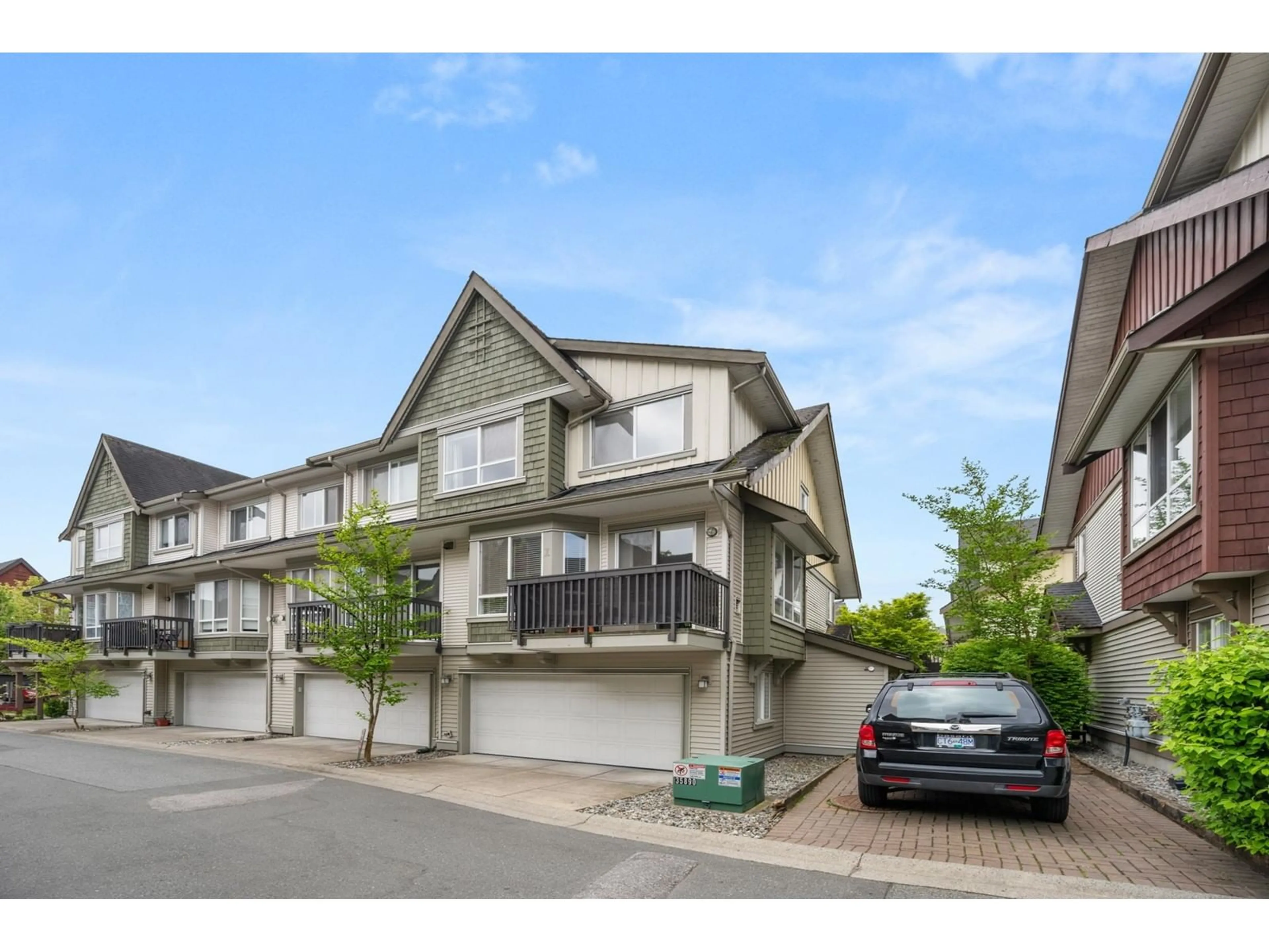 A pic from outside/outdoor area/front of a property/back of a property/a pic from drone, street for 19 - 7155 189, Surrey British Columbia V4N5S8