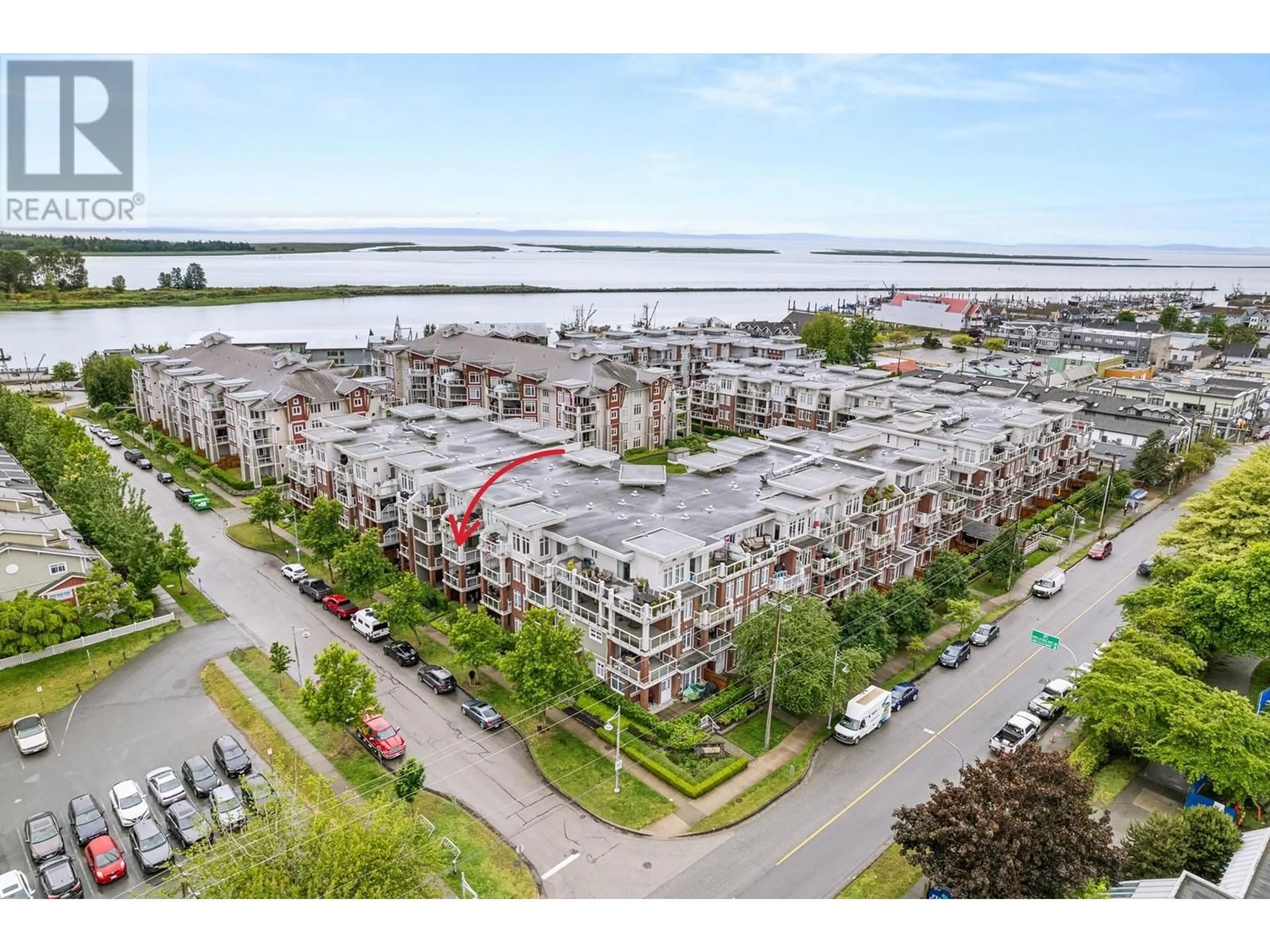 A pic from outside/outdoor area/front of a property/back of a property/a pic from drone, water/lake/river/ocean view for 325 - 4280 MONCTON STREET, Richmond British Columbia V7E6T4