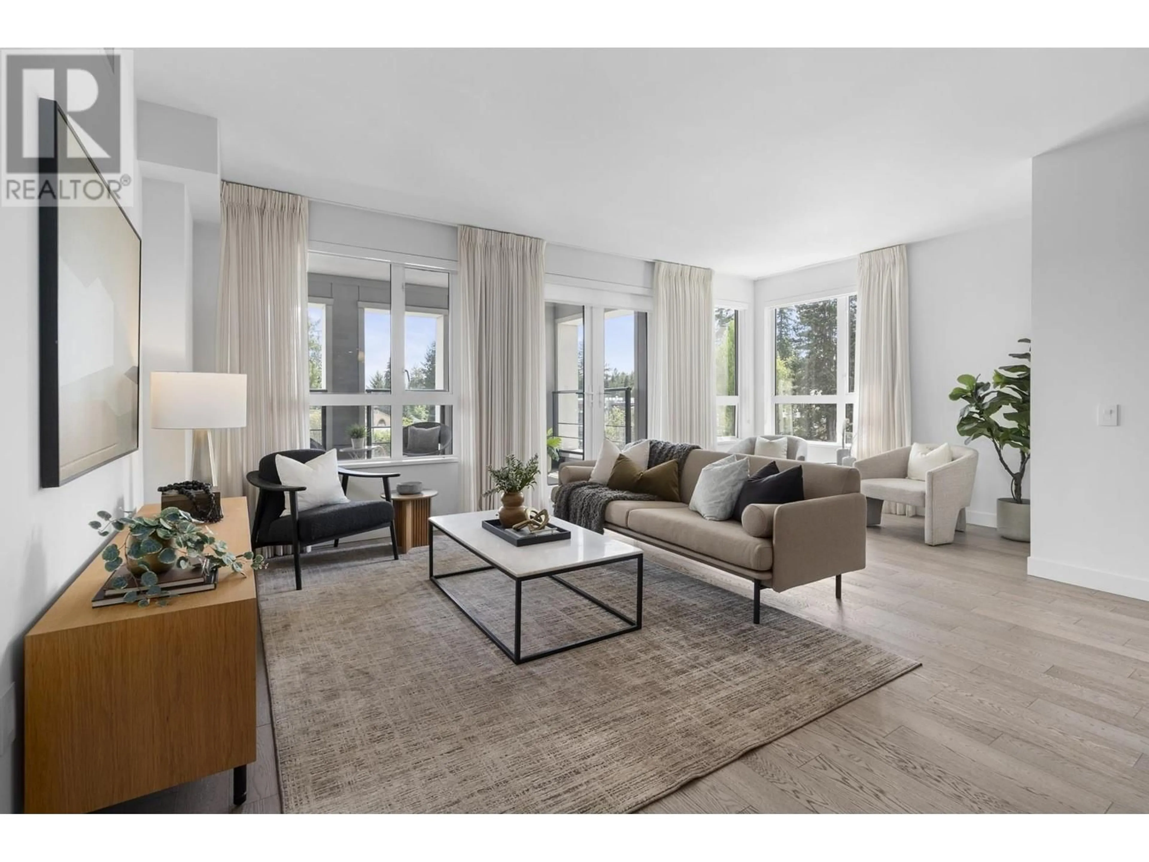 Living room with furniture, unknown for 312 - 3220 CONNAUGHT CRESCENT, North Vancouver British Columbia V7R0A5