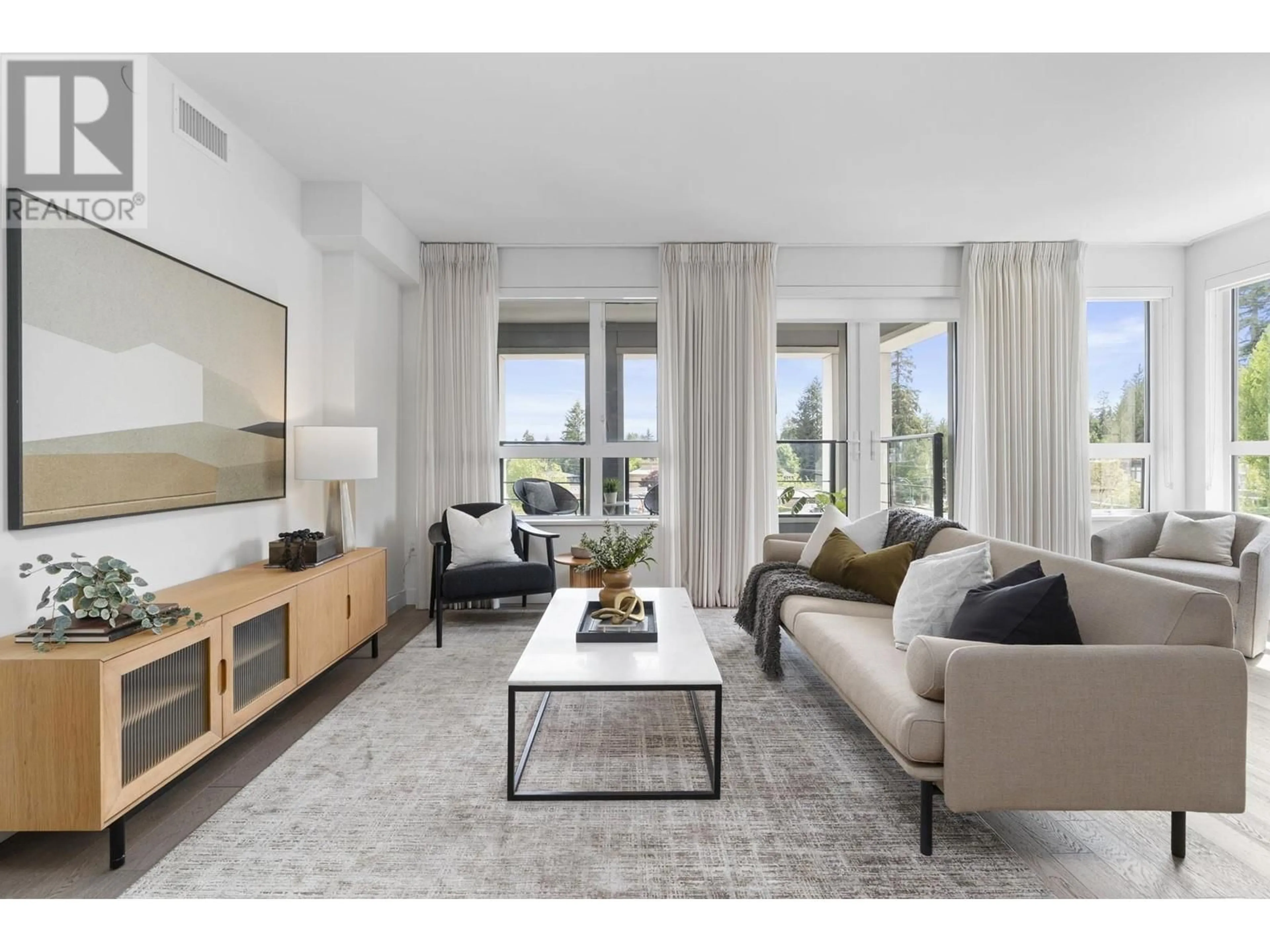 Living room with furniture, unknown for 312 - 3220 CONNAUGHT CRESCENT, North Vancouver British Columbia V7R0A5