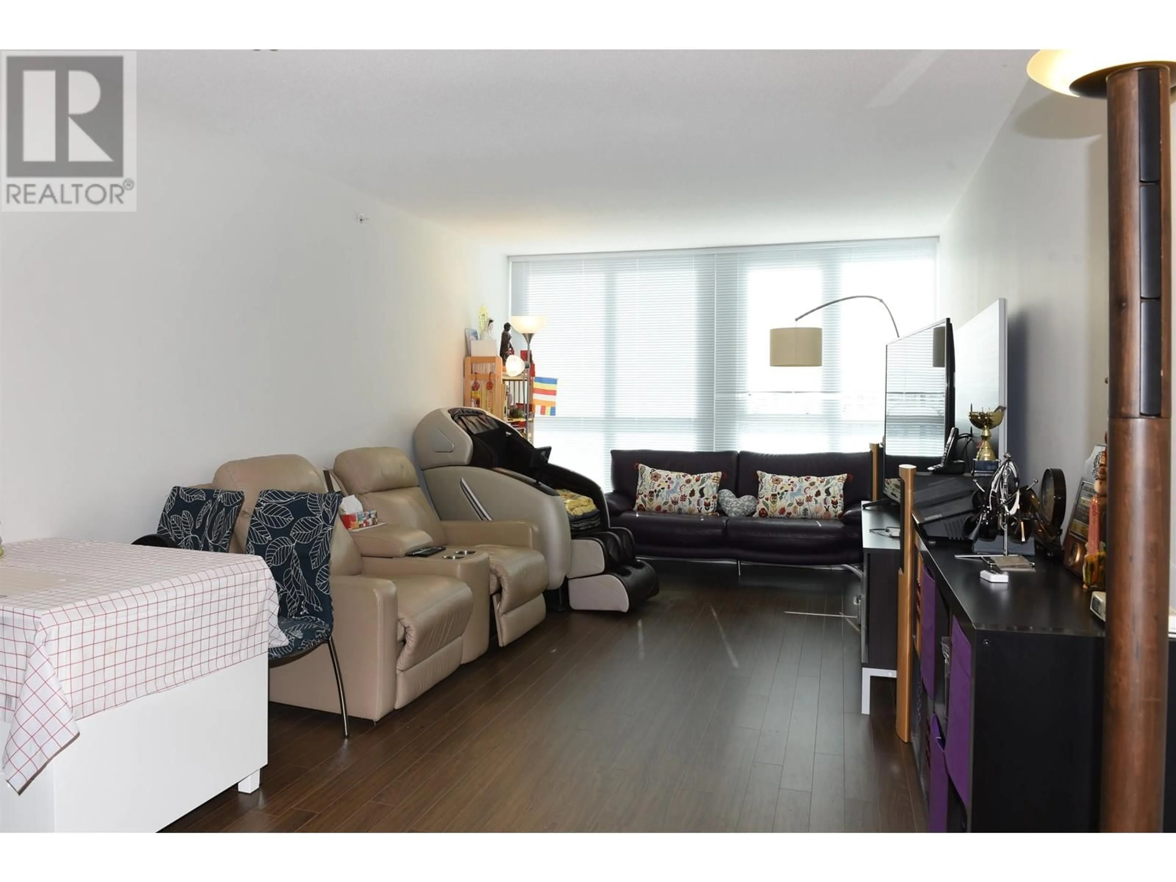 Living room with furniture, wood/laminate floor for 1609 - 8033 SABA ROAD, Richmond British Columbia V6Y4M8
