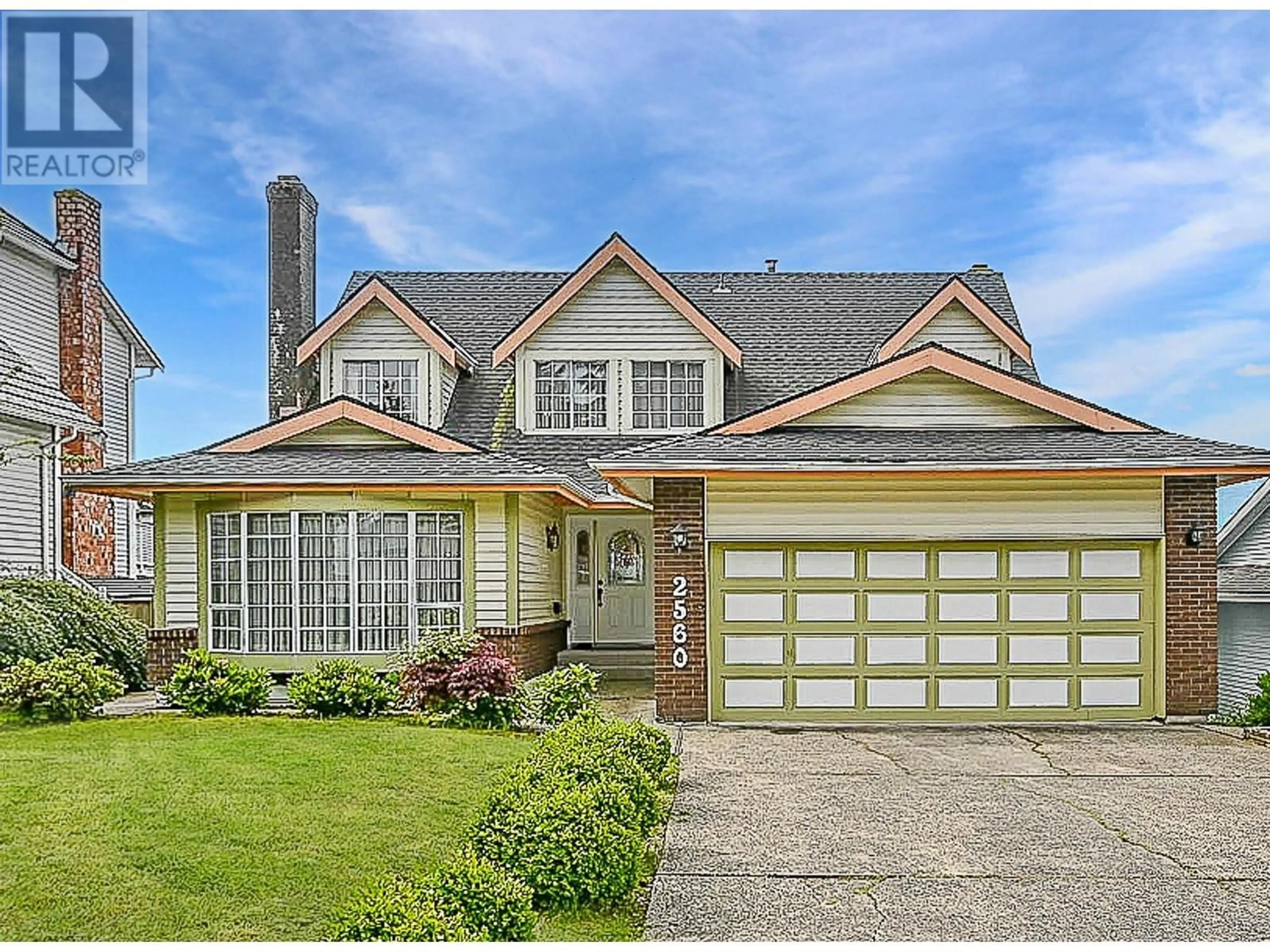 Home with vinyl exterior material, street for 2560 BLUEBELL AVENUE, Coquitlam British Columbia V3E2G1