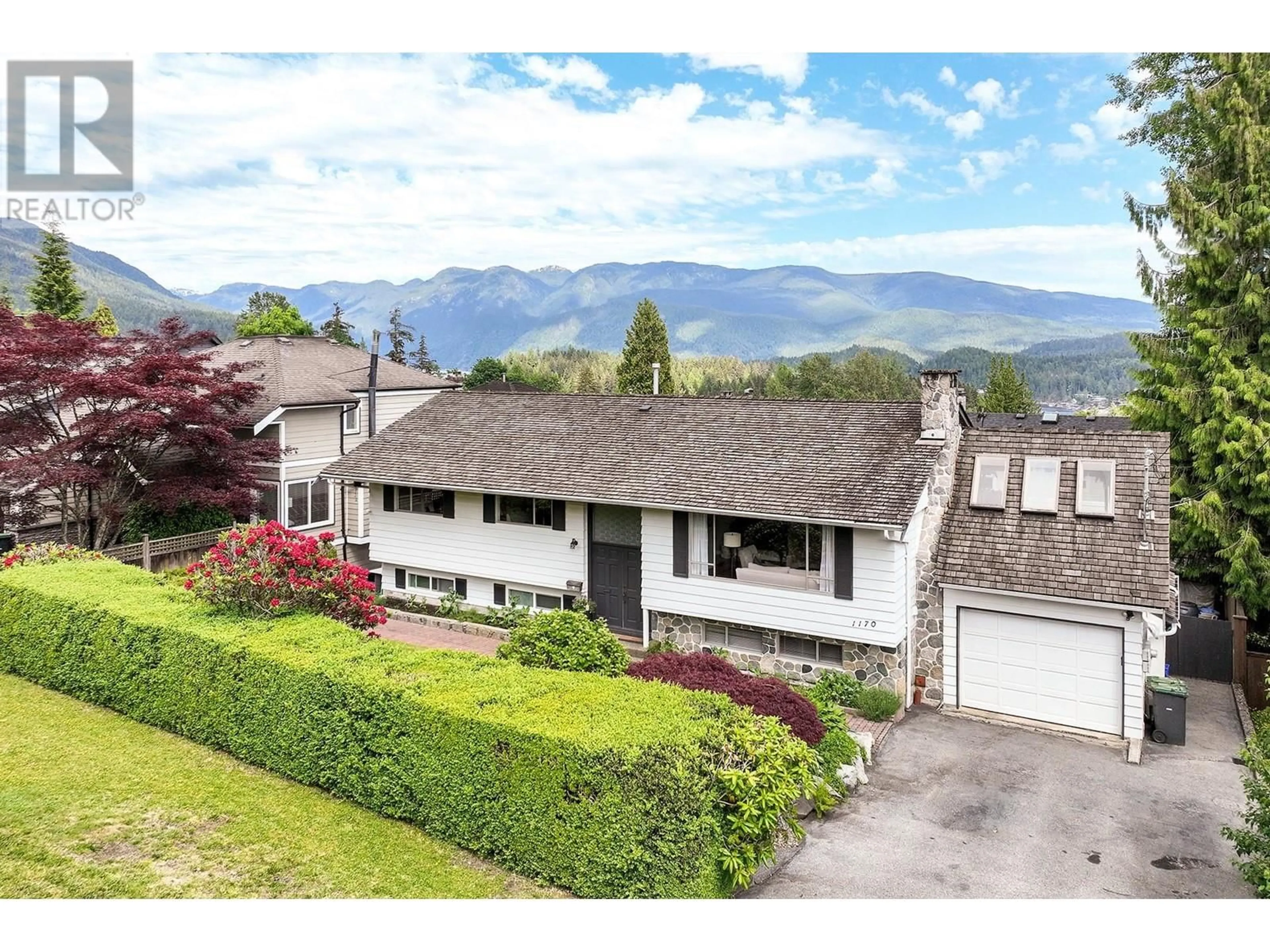 A pic from outside/outdoor area/front of a property/back of a property/a pic from drone, mountain view for 1170 BEAUFORT ROAD, North Vancouver British Columbia V7G1R7