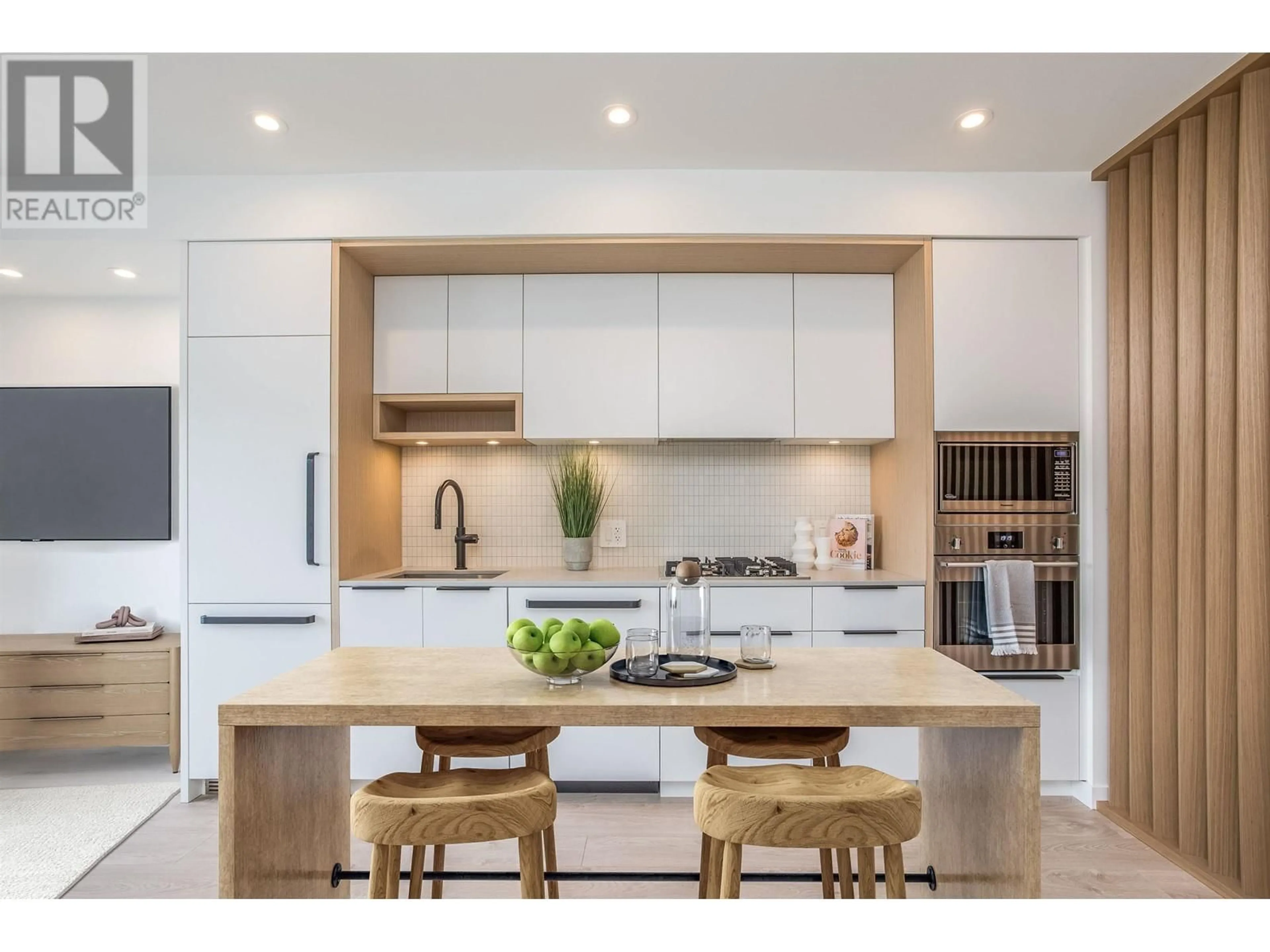 Contemporary kitchen, wood/laminate floor for 210 - 2520 GUELPH STREET, Vancouver British Columbia V5T0K7