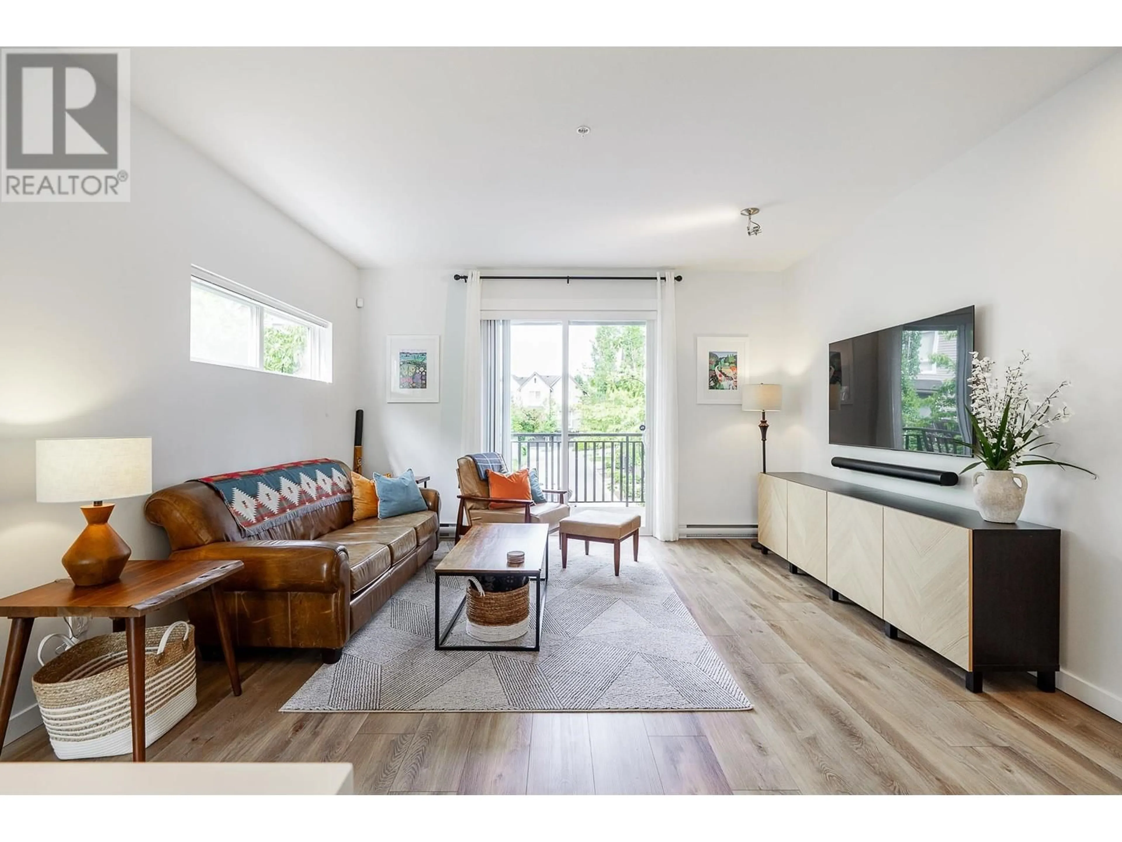 Living room with furniture, wood/laminate floor for 70 - 2310 RANGER LANE, Port Coquitlam British Columbia V3B0K3