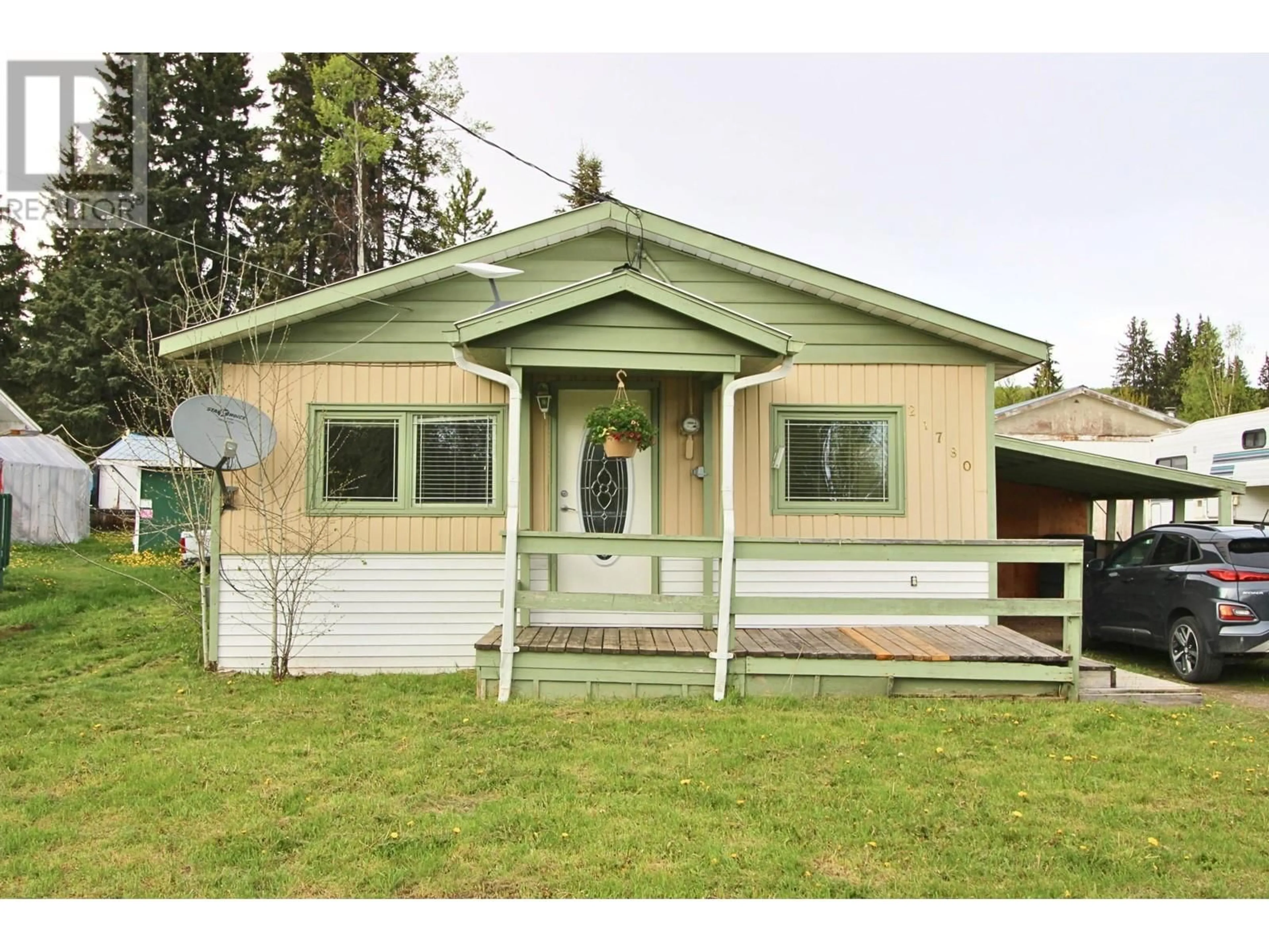 Home with vinyl exterior material, street for 21780 RAILWAY AVENUE, Topley British Columbia V0J2Y0