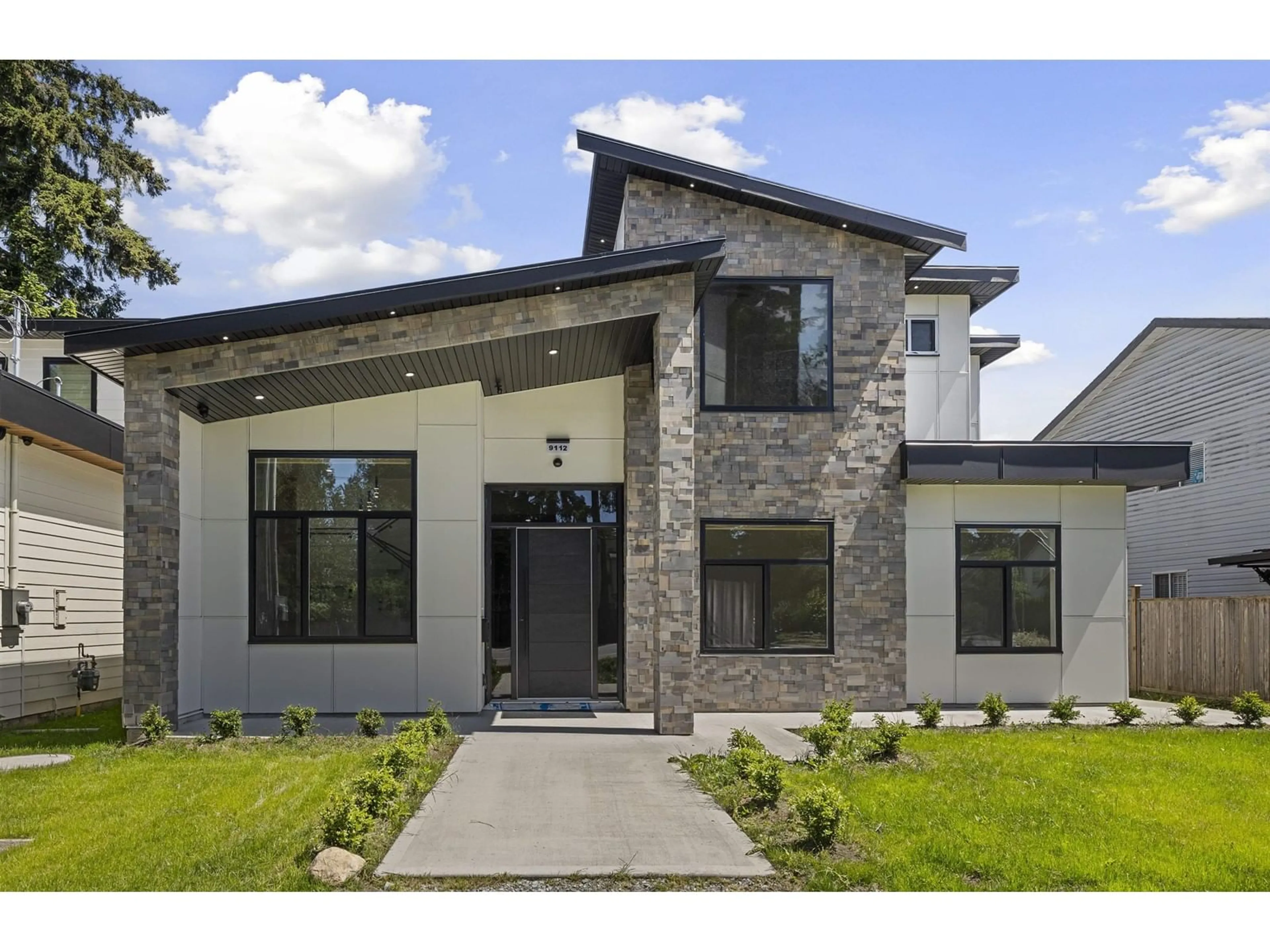 Home with brick exterior material, street for 9112 156, Surrey British Columbia V3R5Y8