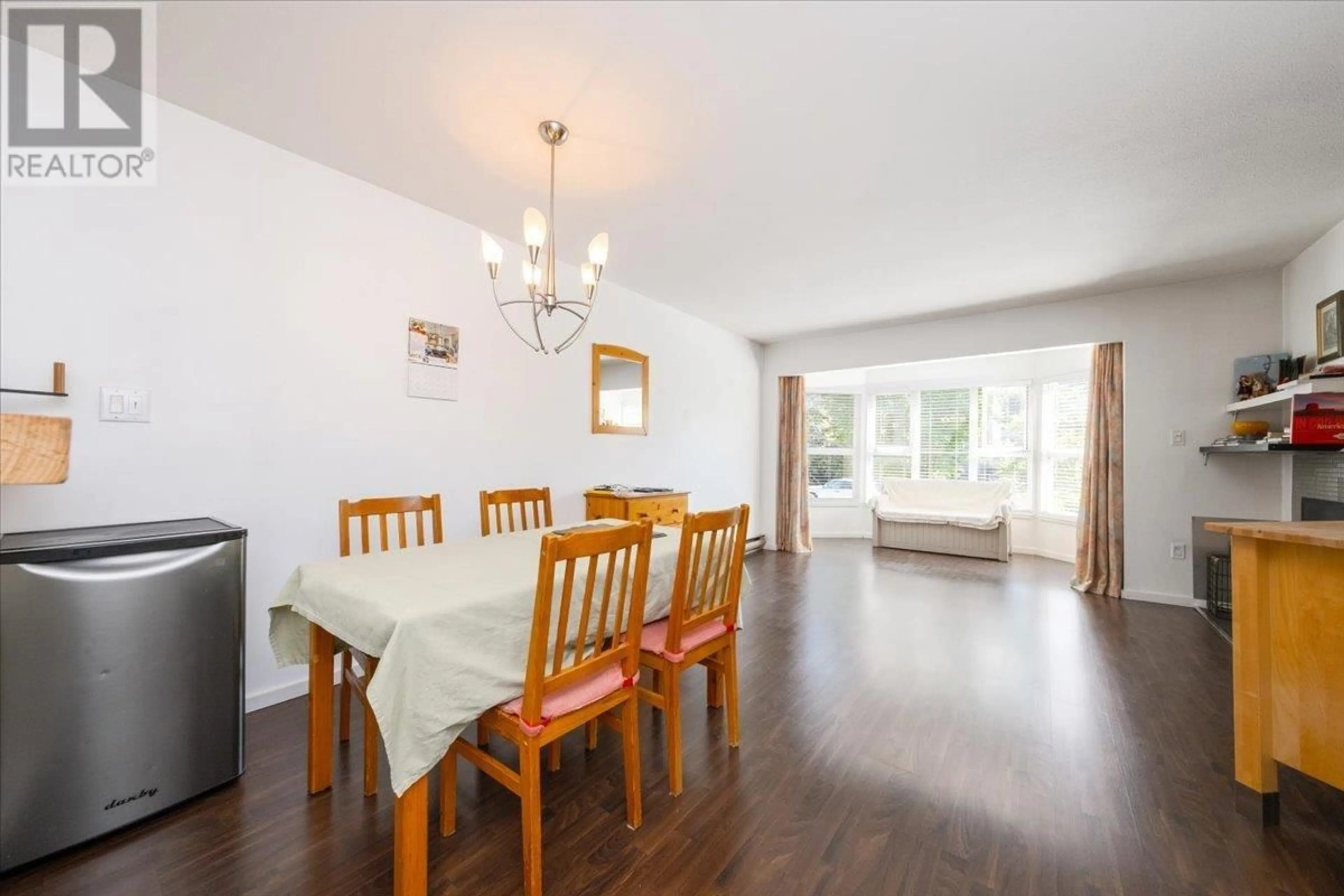 Dining room, wood/laminate floor for 206 - 2255 ETON STREET, Vancouver British Columbia V5L1C9