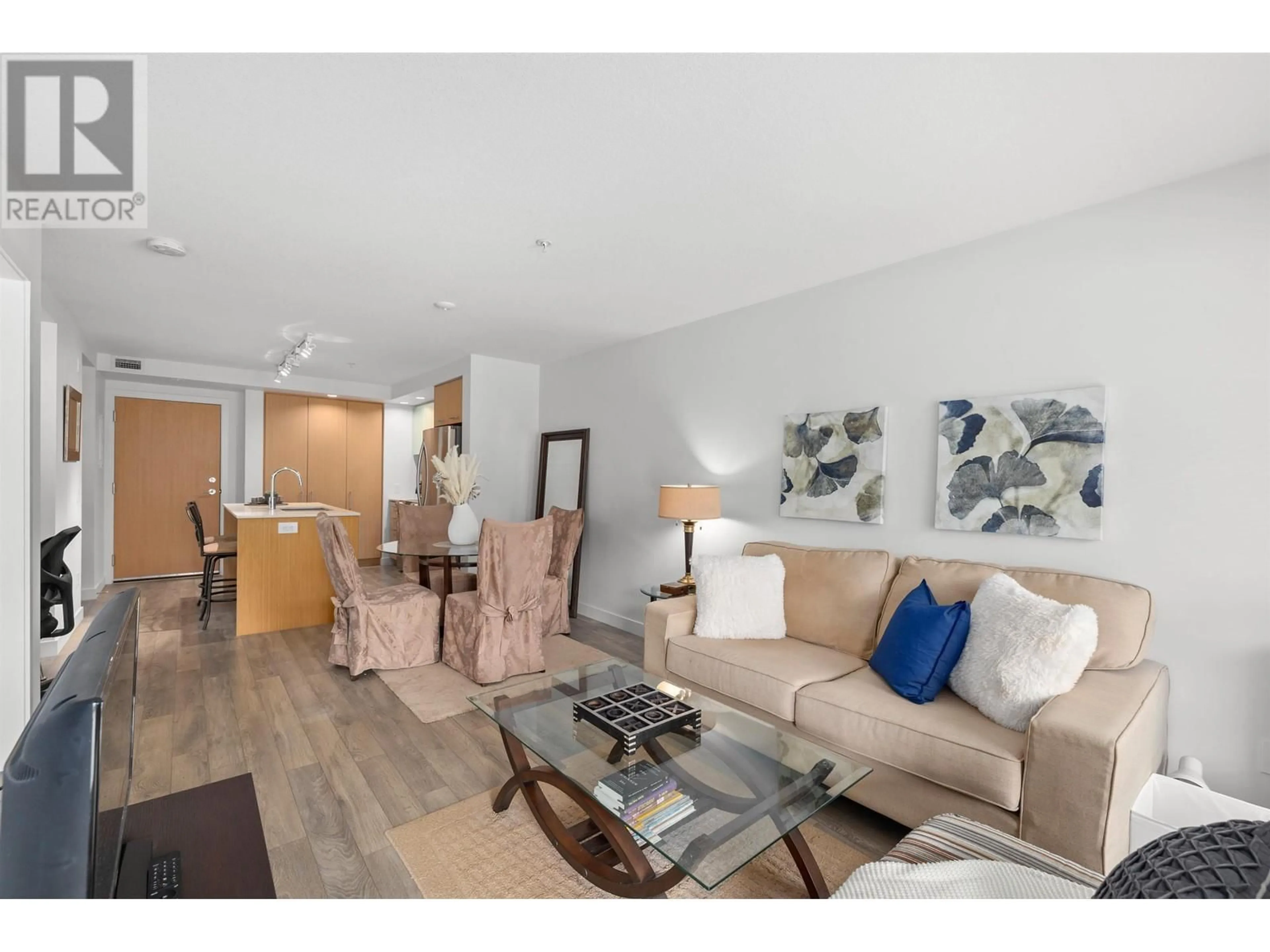 Living room with furniture, wood/laminate floor for 213 - 221 3RD STREET, North Vancouver British Columbia V7L0C1