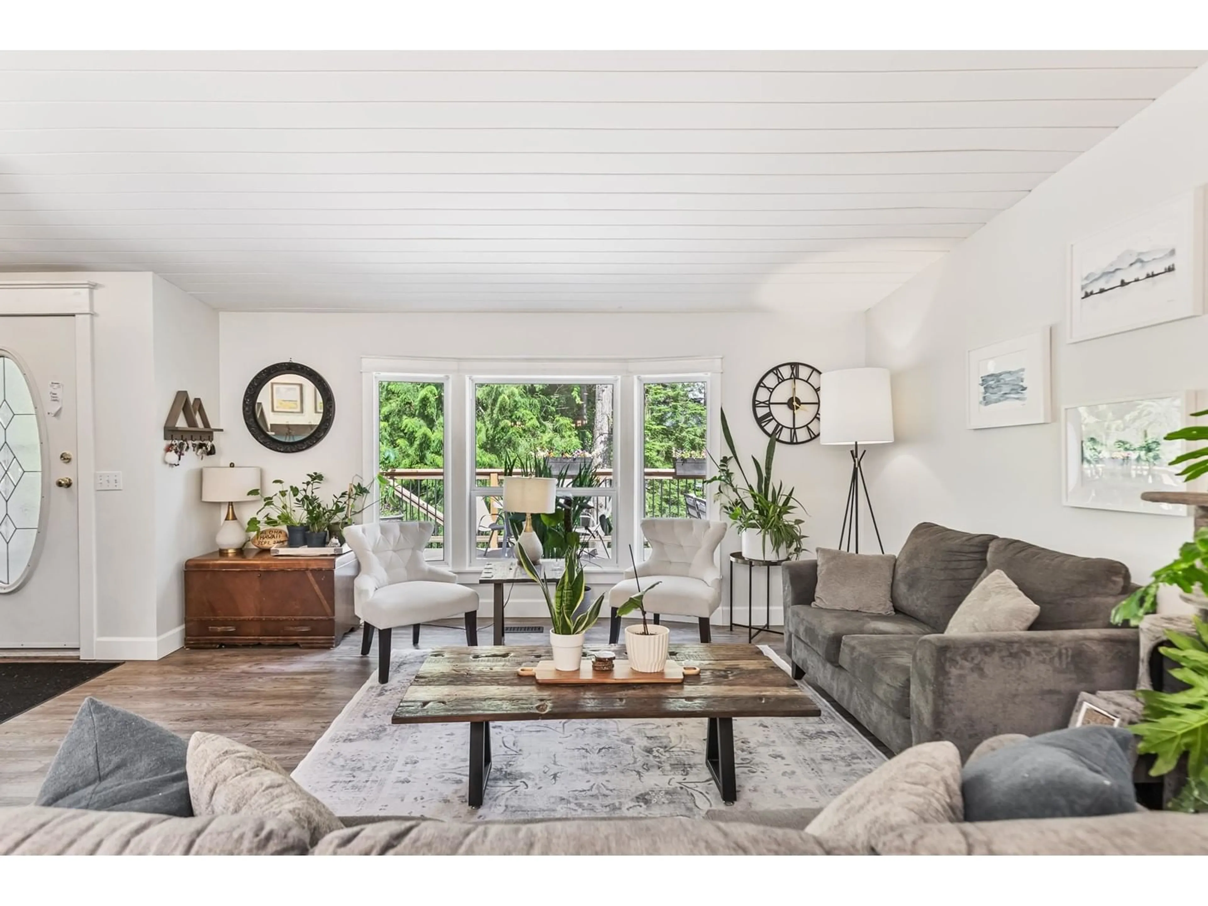 Living room with furniture, wood/laminate floor for 12075 CARR, Mission British Columbia V4S1B8