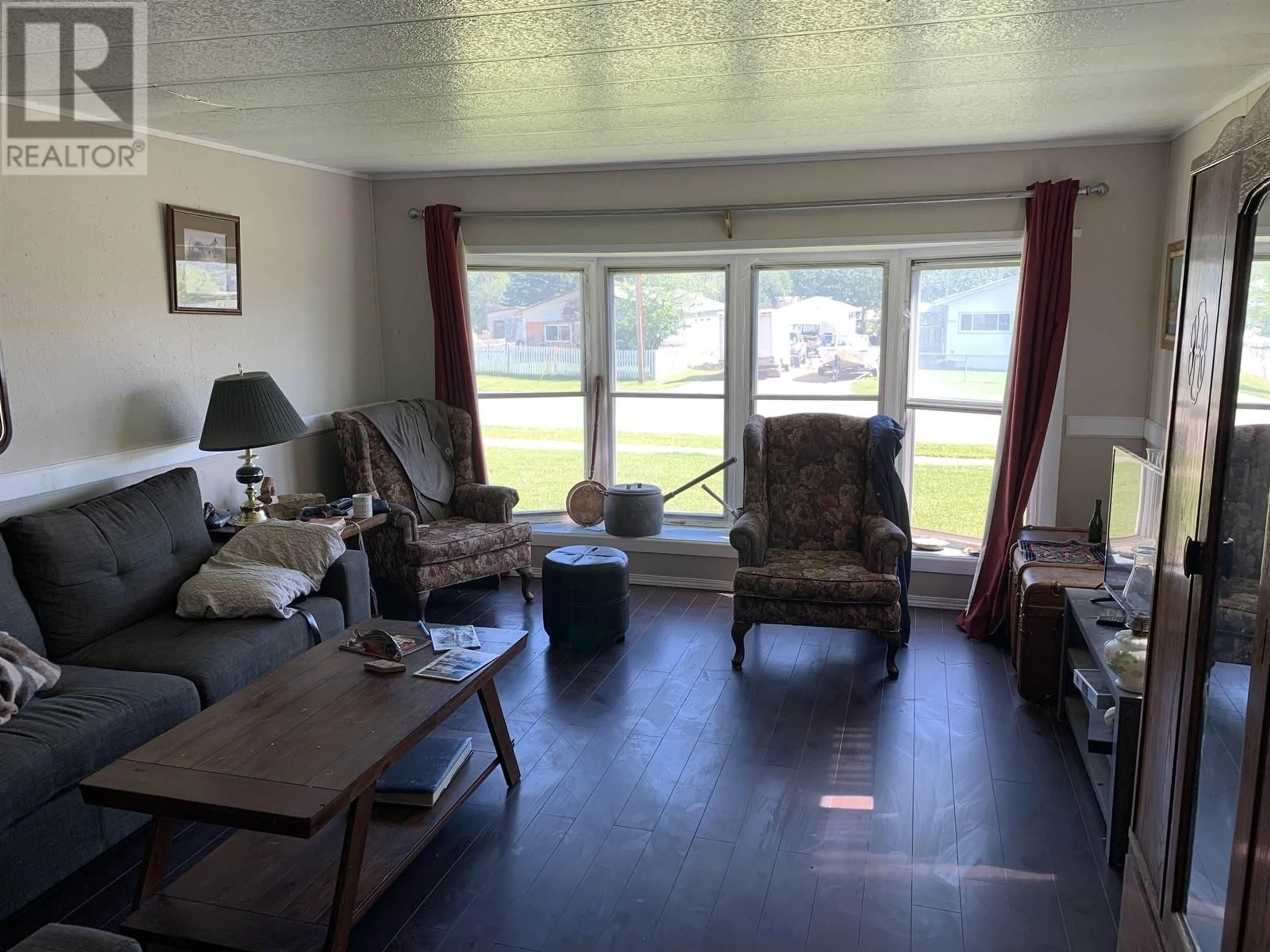 Living room with furniture, unknown for 5323 42 STREET, Fort Nelson British Columbia V0C1R0