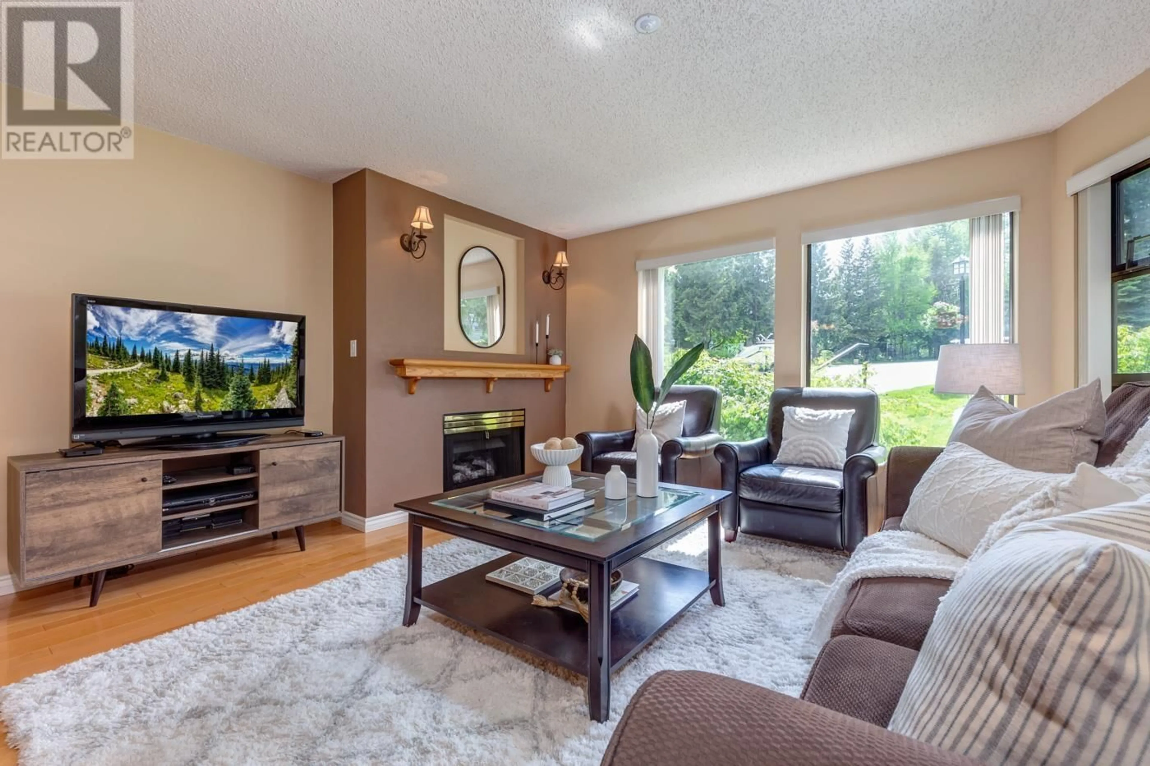 Living room with furniture, unknown for 212 - 3317 PTARMIGAN PLACE, Whistler British Columbia V8E0V7