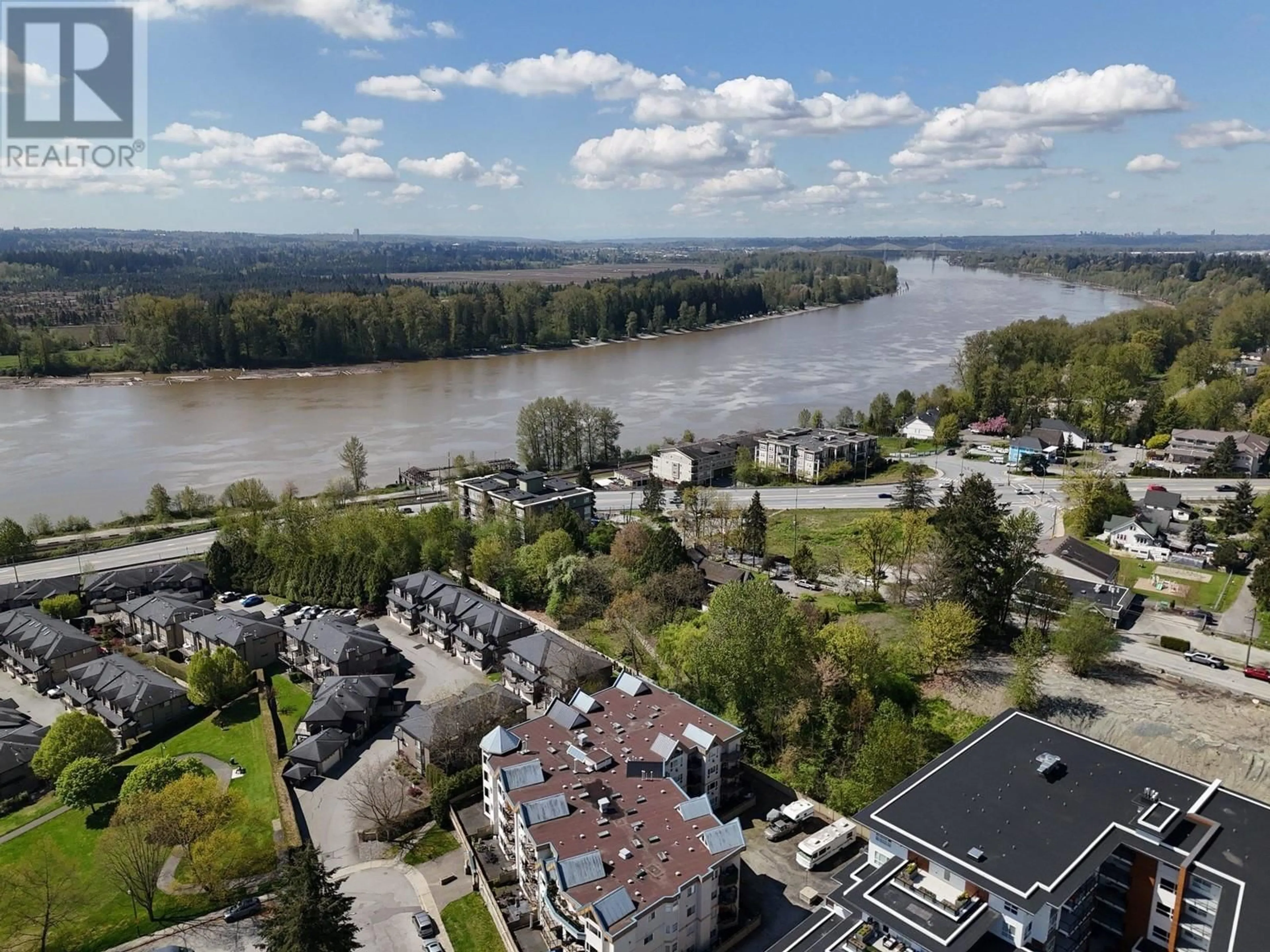 A pic from outside/outdoor area/front of a property/back of a property/a pic from drone, water/lake/river/ocean view for 312 - 11595 FRASER STREET, Maple Ridge British Columbia V2X0X7