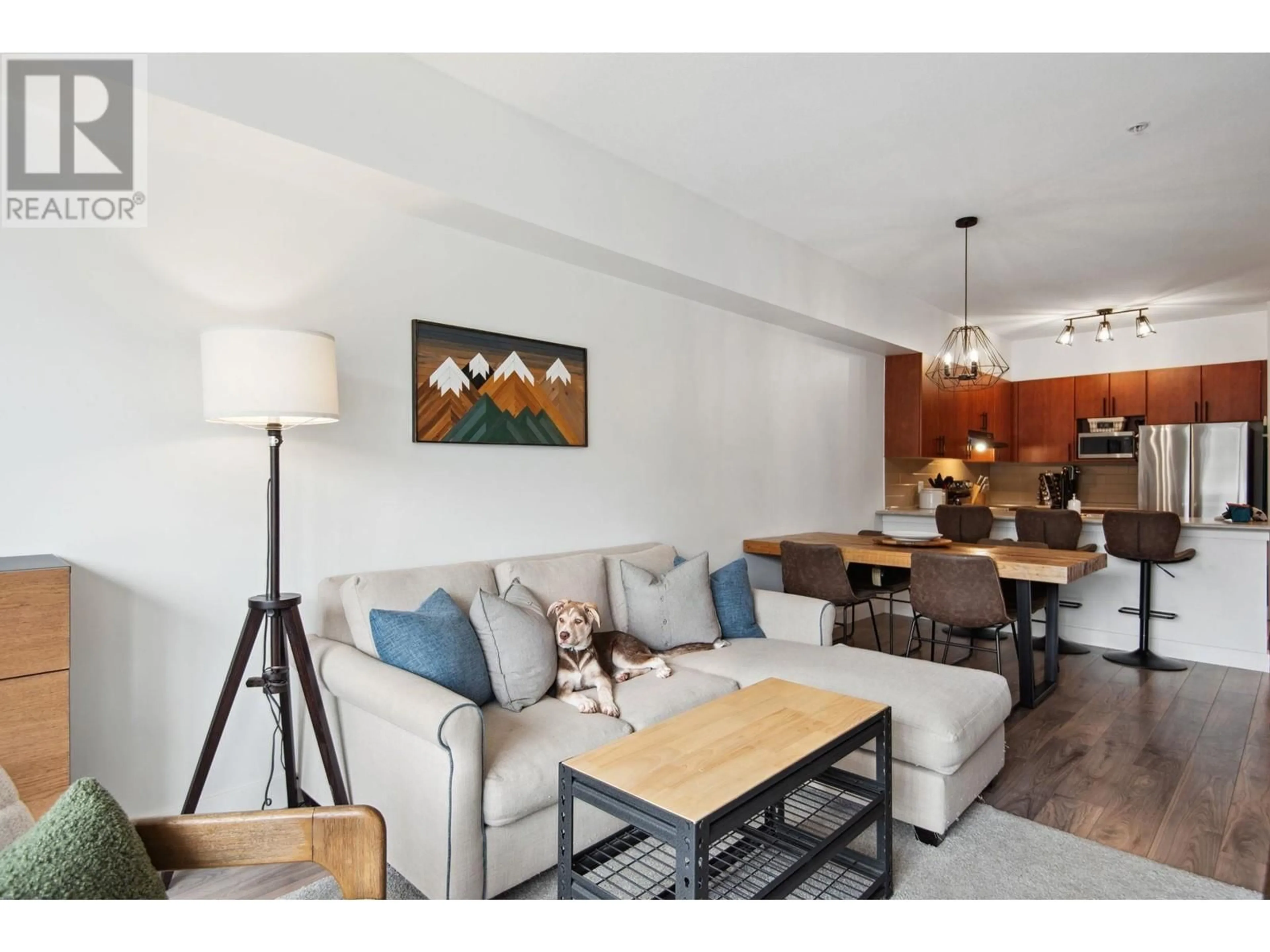 Living room with furniture, wood/laminate floor for 307 - 40437 TANTALUS ROAD, Squamish British Columbia V0N3G0