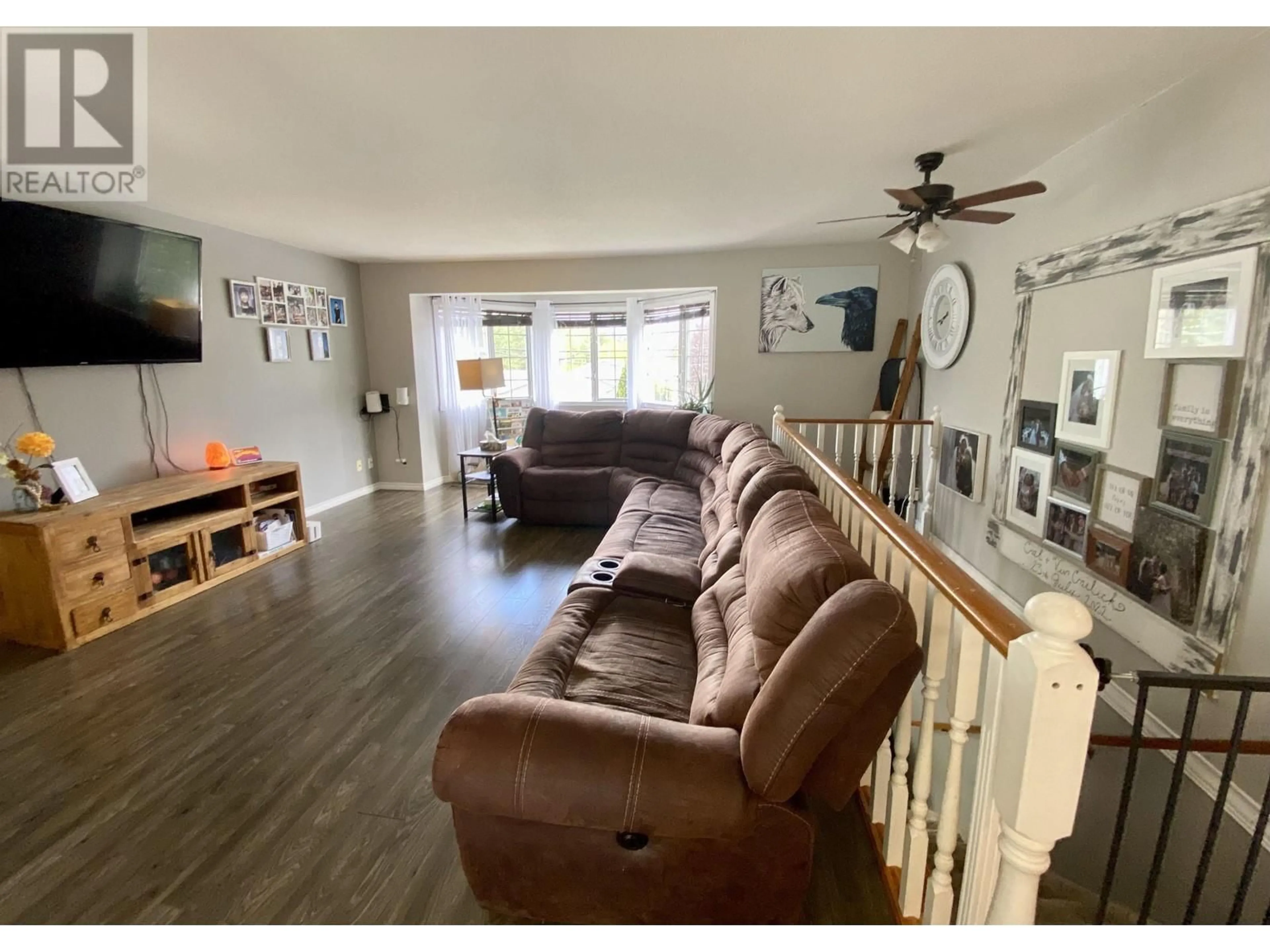 Living room with furniture, wood/laminate floor for 3703 WALNUT DRIVE, Terrace British Columbia V8G5G1