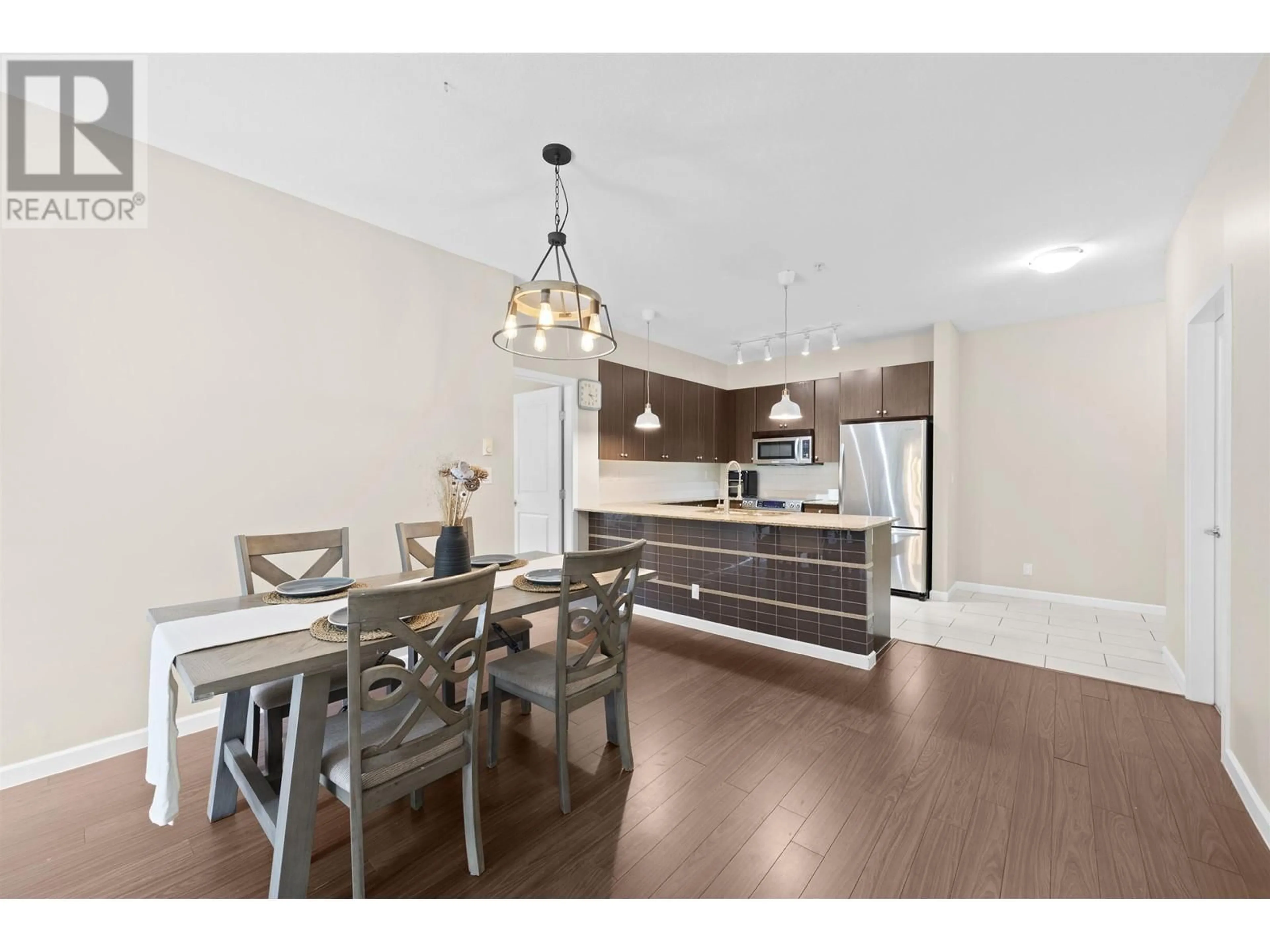 Open concept kitchen, wood/laminate floor for 209 - 270 FRANCIS WAY, New Westminster British Columbia V3L0C3