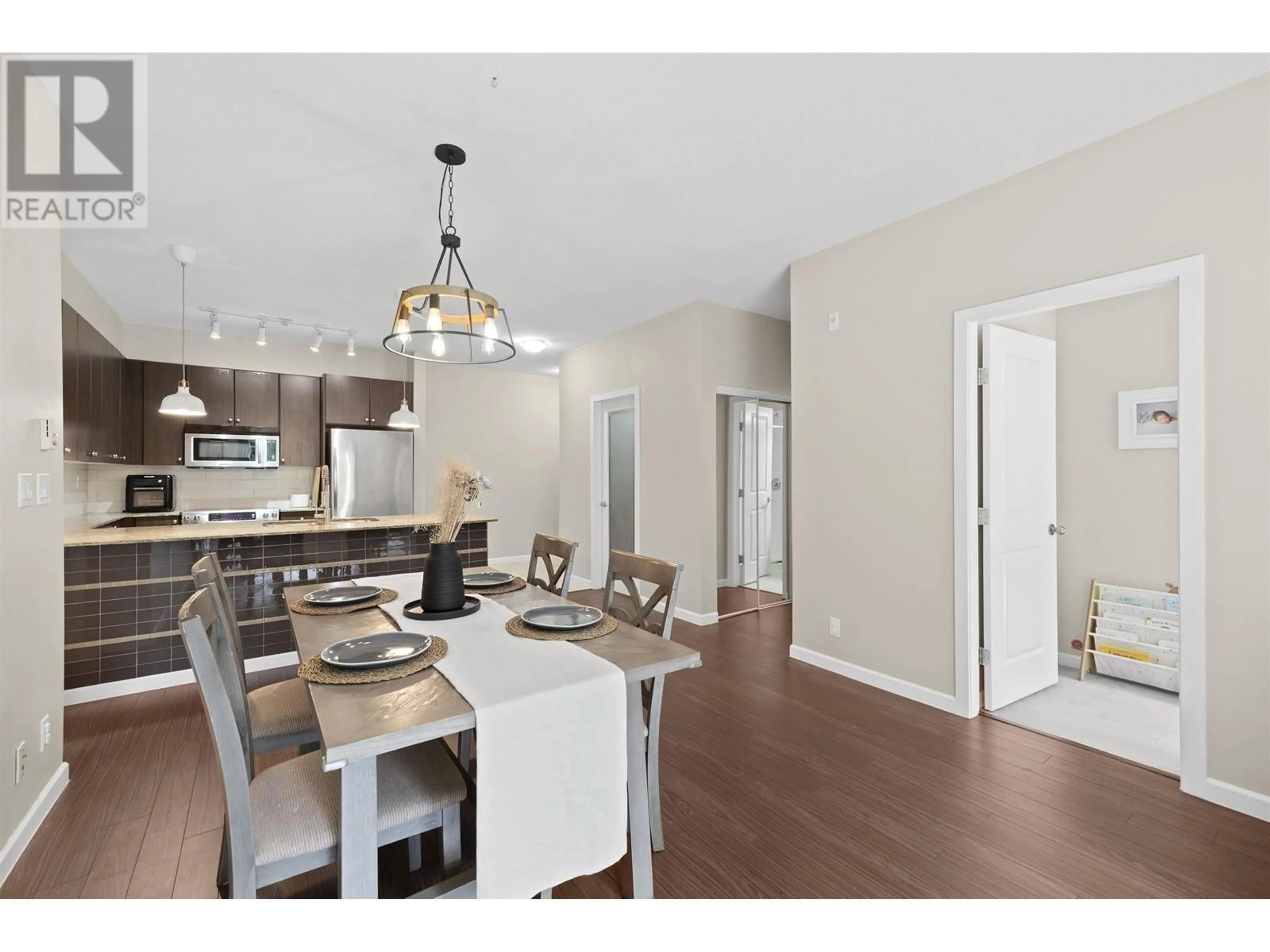 Open concept kitchen, wood/laminate floor for 209 - 270 FRANCIS WAY, New Westminster British Columbia V3L0C3
