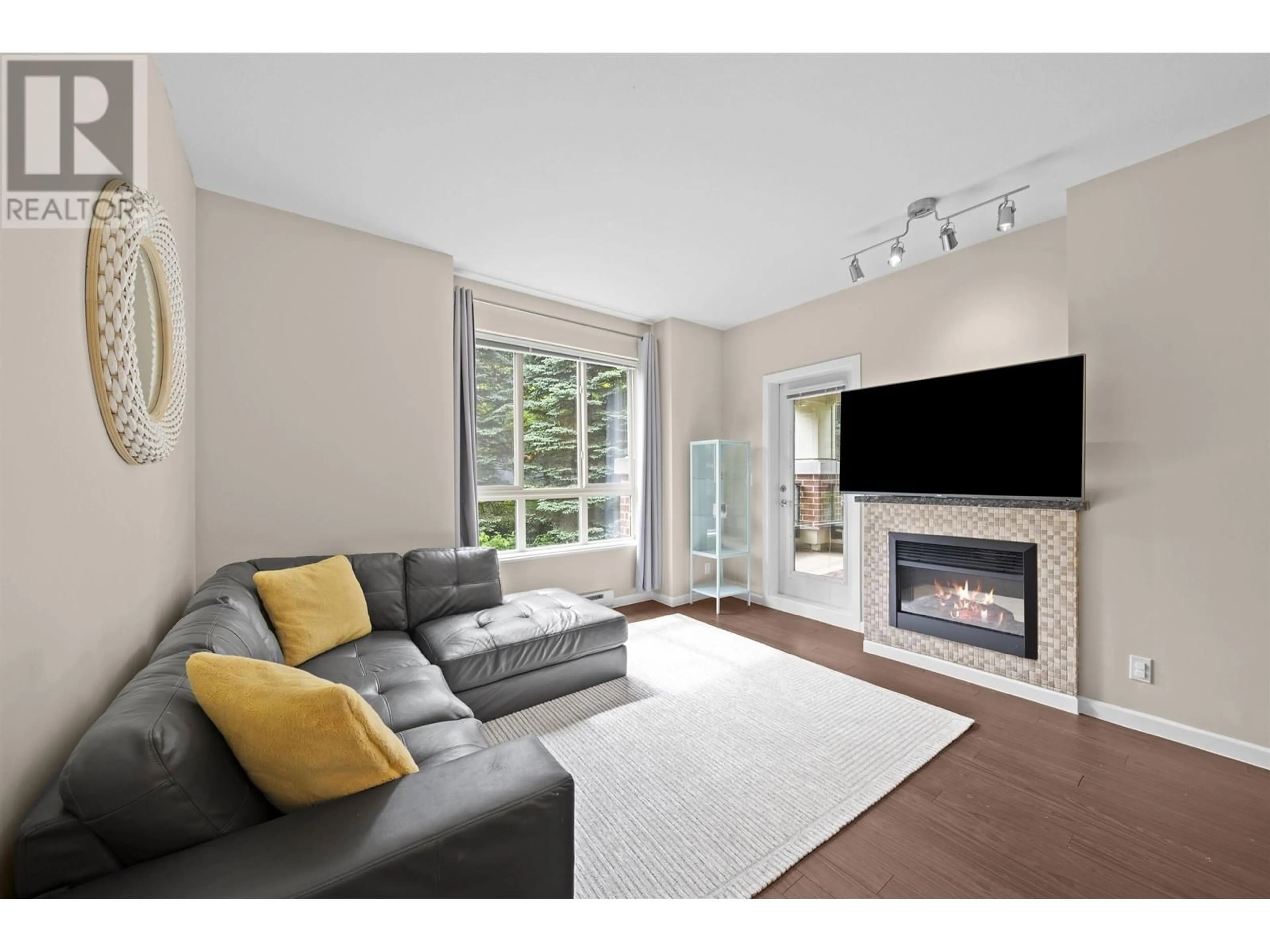 Living room with furniture, unknown for 209 - 270 FRANCIS WAY, New Westminster British Columbia V3L0C3