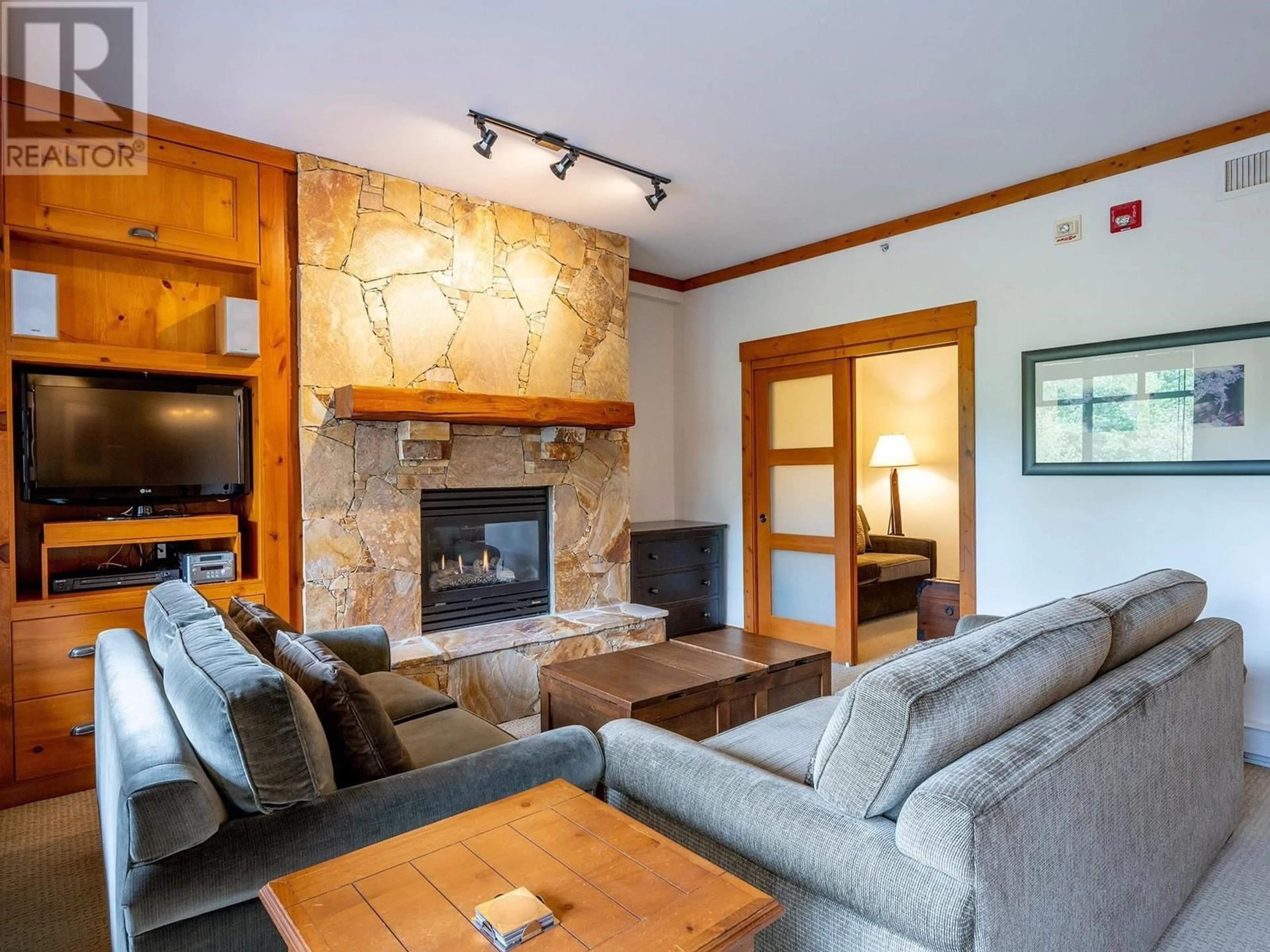 Living room with furniture, unknown for 303 - 2202 GONDOLA WAY, Whistler British Columbia V8E0M7