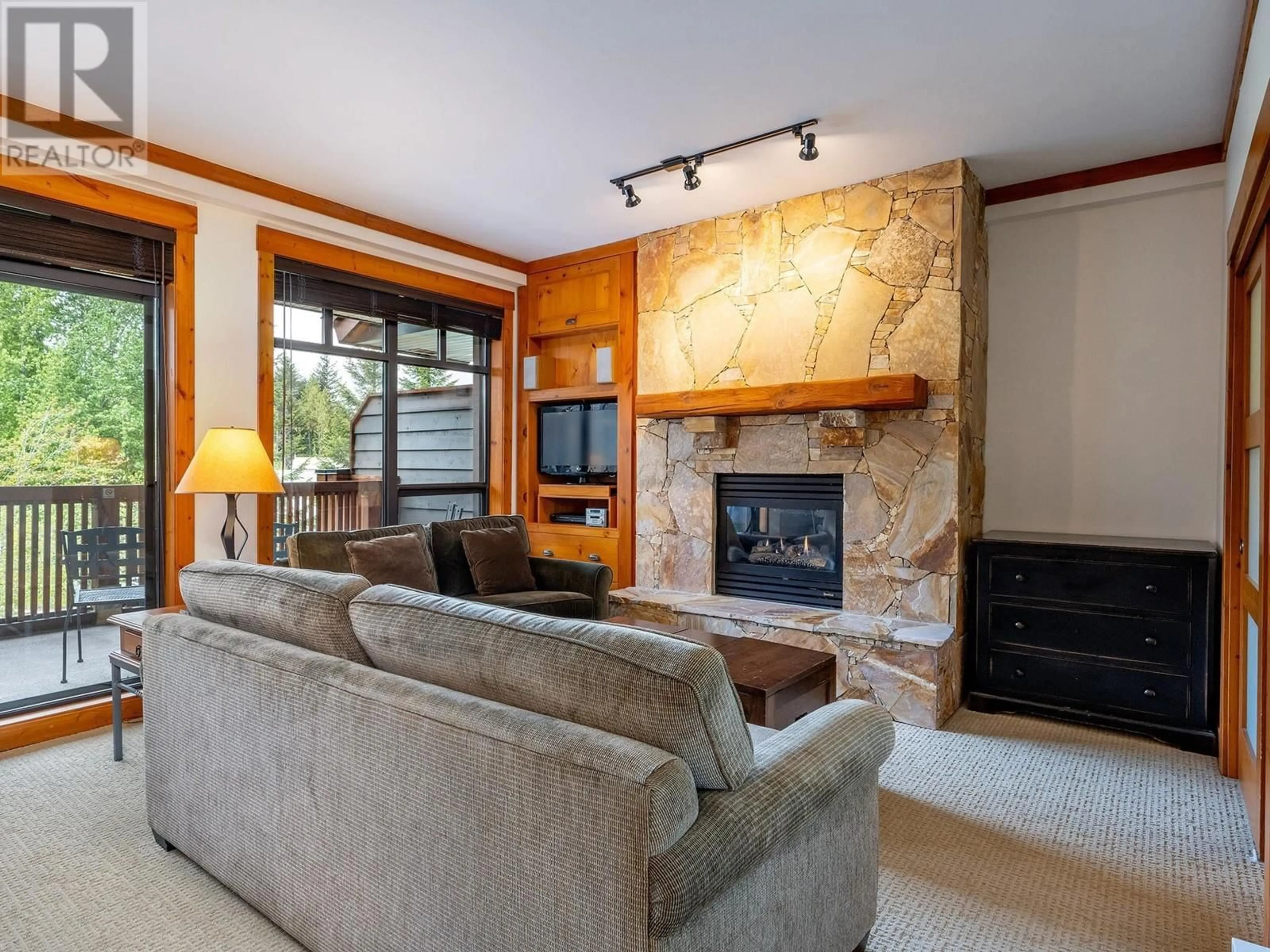 Living room with furniture, unknown for 303 - 2202 GONDOLA WAY, Whistler British Columbia V8E0M7