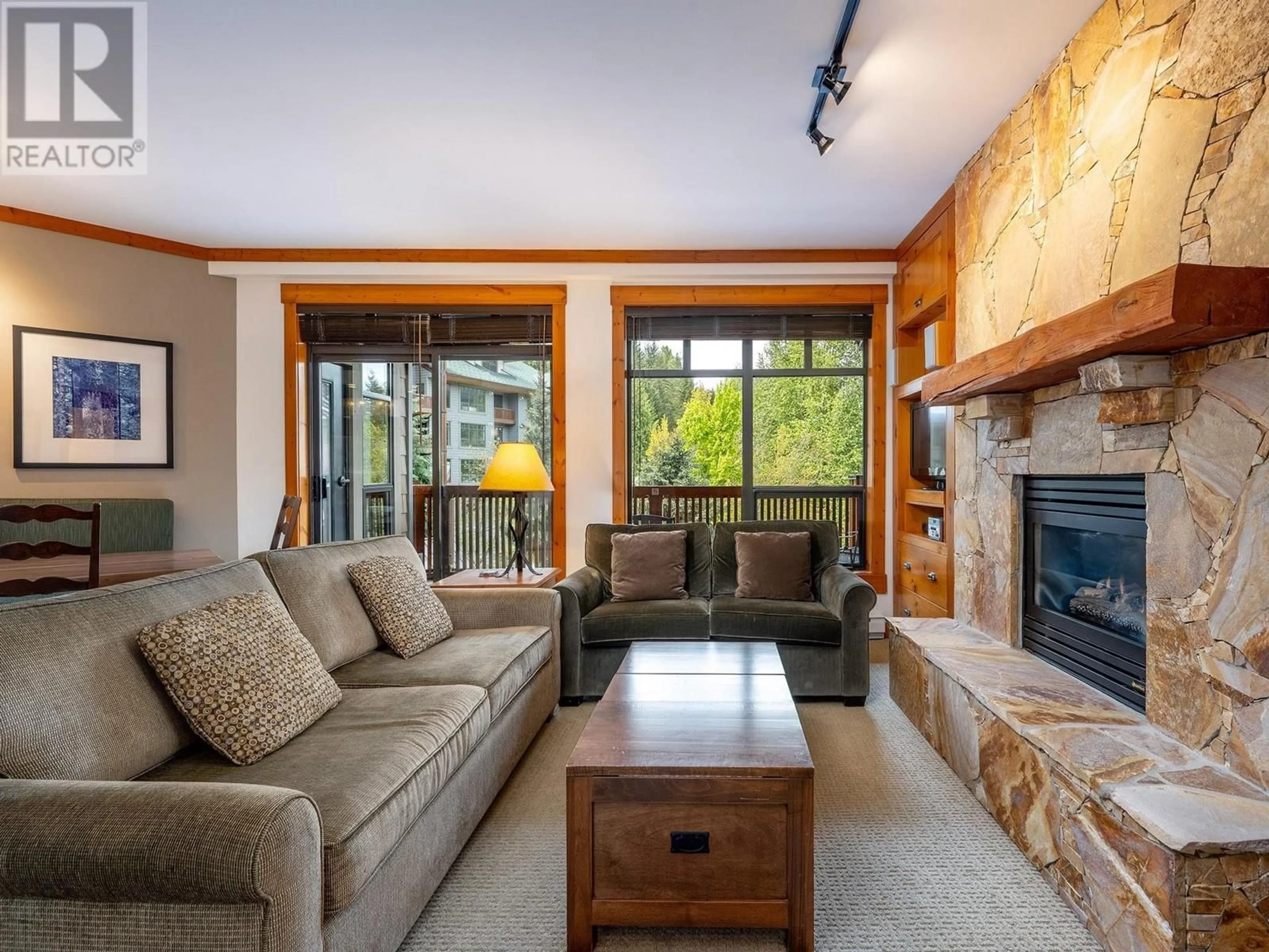 Living room with furniture, unknown for 303 - 2202 GONDOLA WAY, Whistler British Columbia V8E0M7