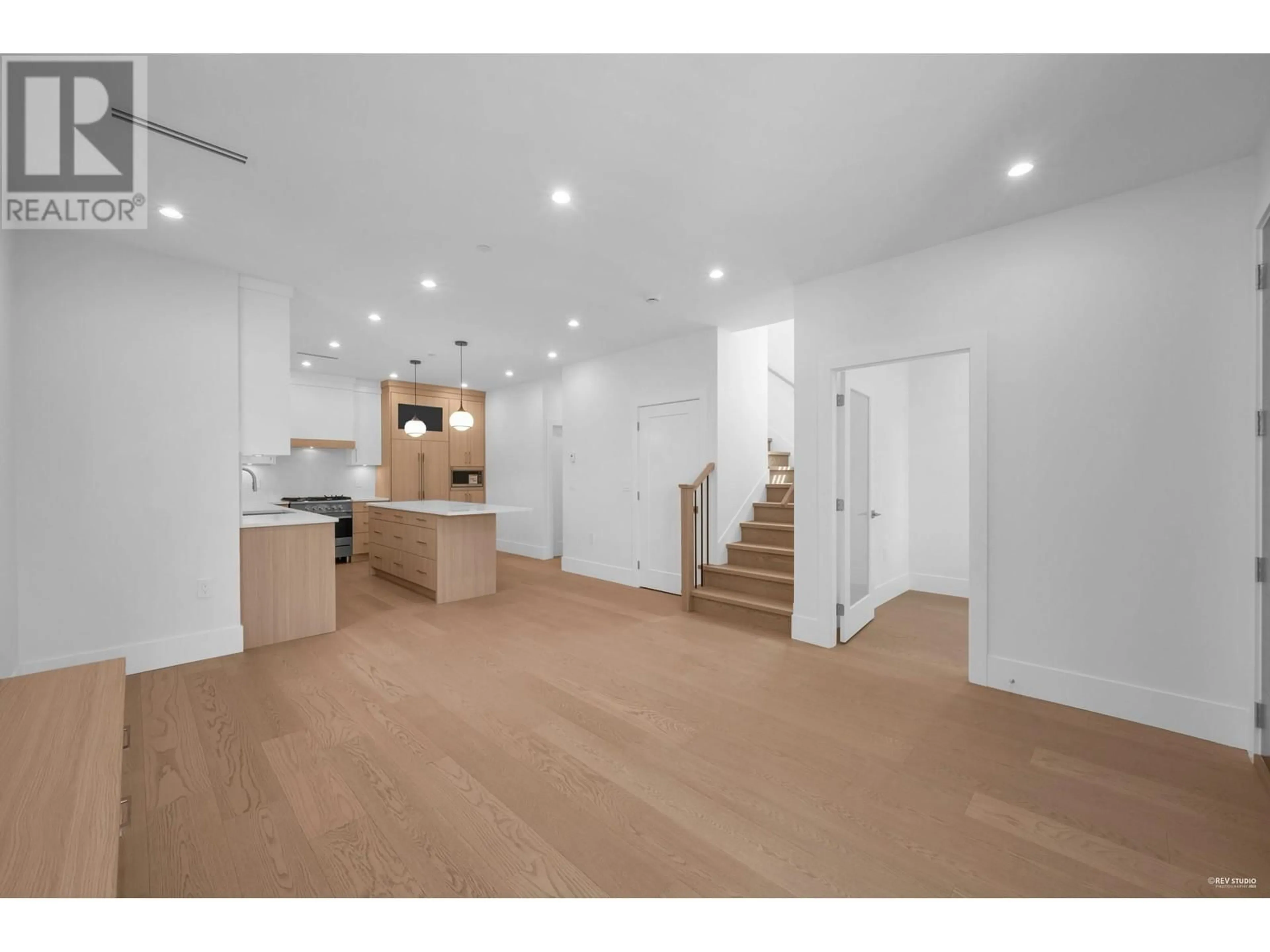 Open concept kitchen, wood/laminate floor for 3675 48TH AVENUE, Vancouver British Columbia V5S1J1
