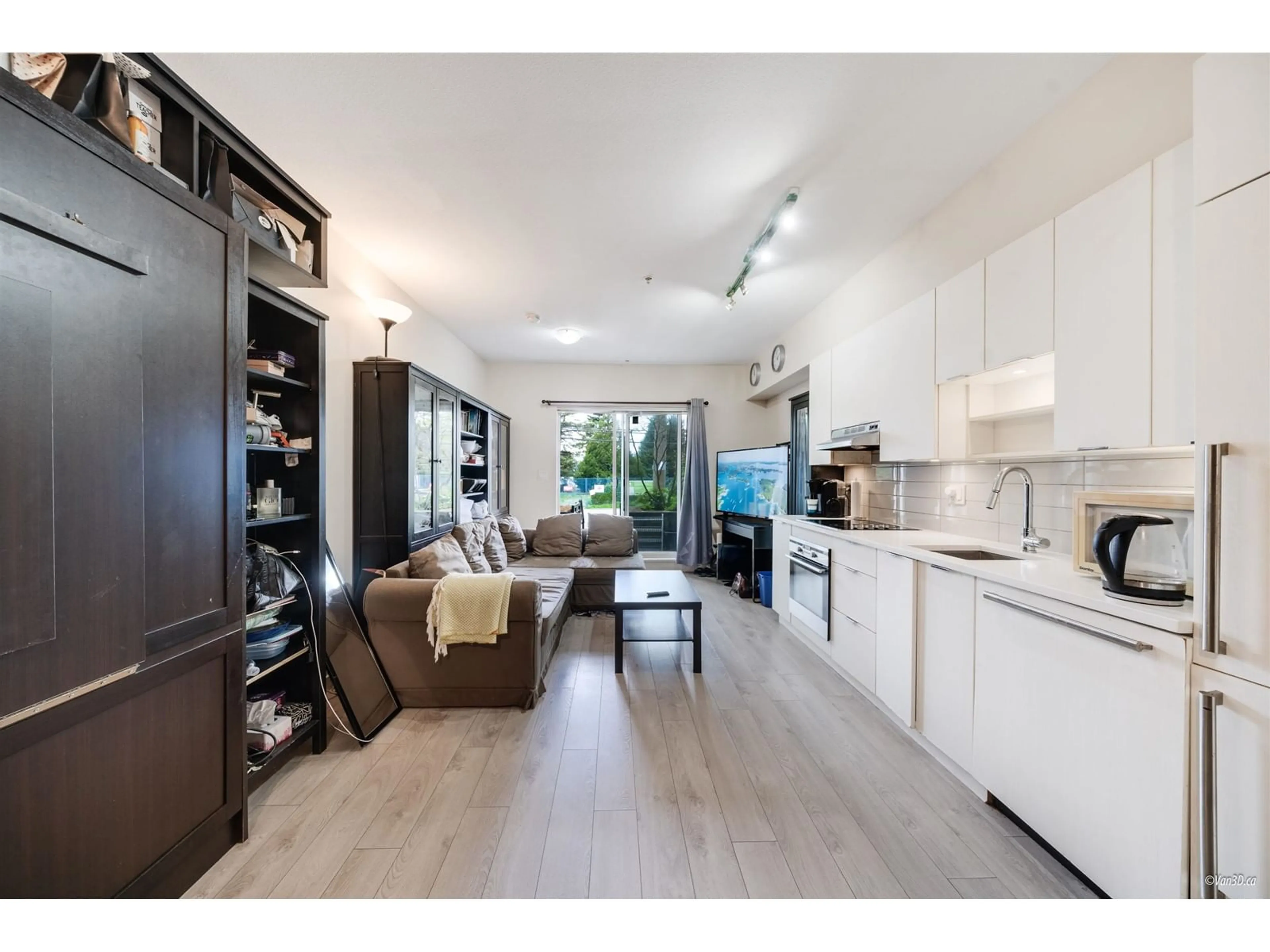Open concept kitchen, wood/laminate floor for 101 - 13678 GROSVENOR, Surrey British Columbia V3R5E2