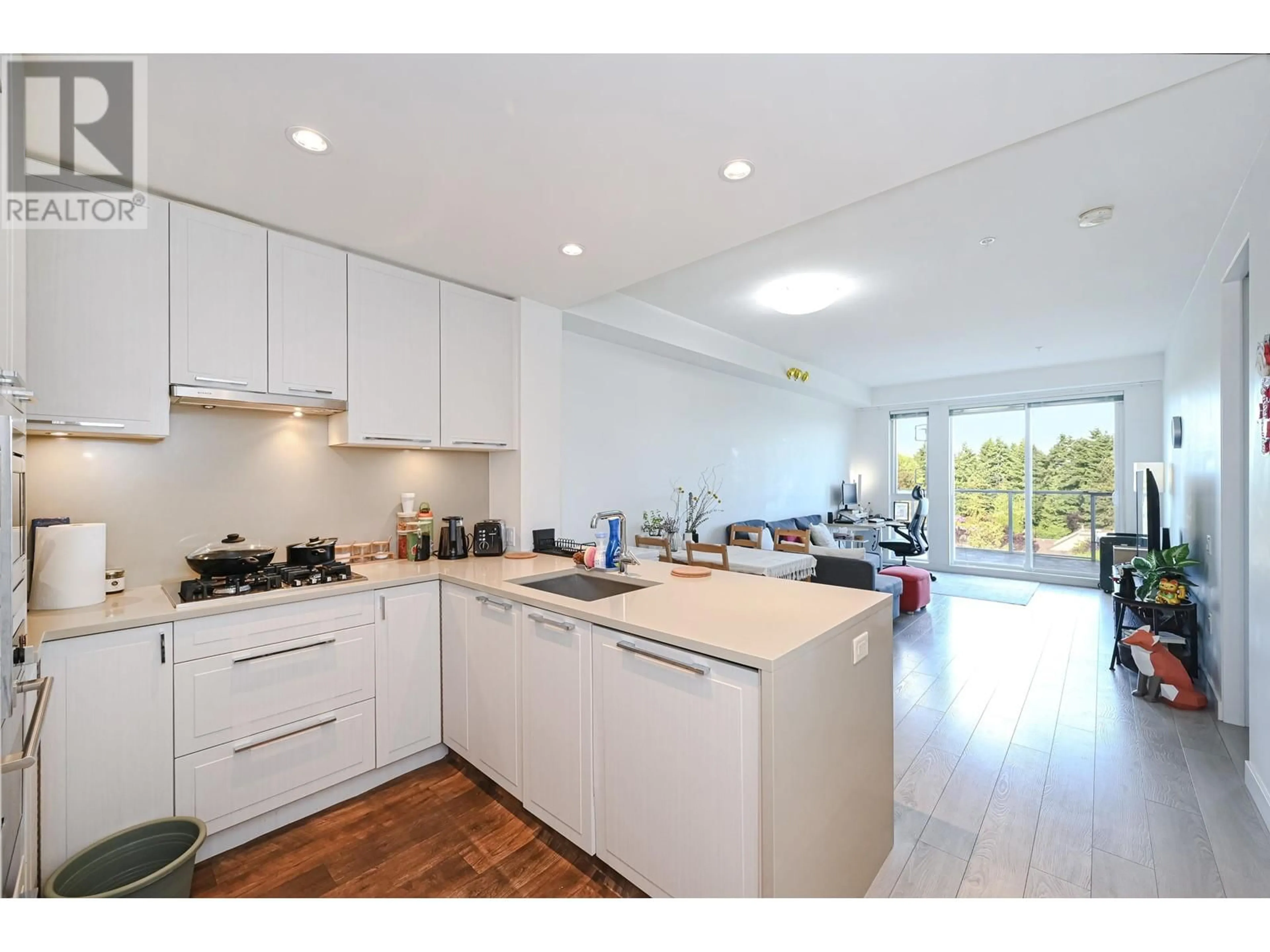 Open concept kitchen, unknown for 602 - 6633 CAMBIE STREET, Vancouver British Columbia V6P0E5