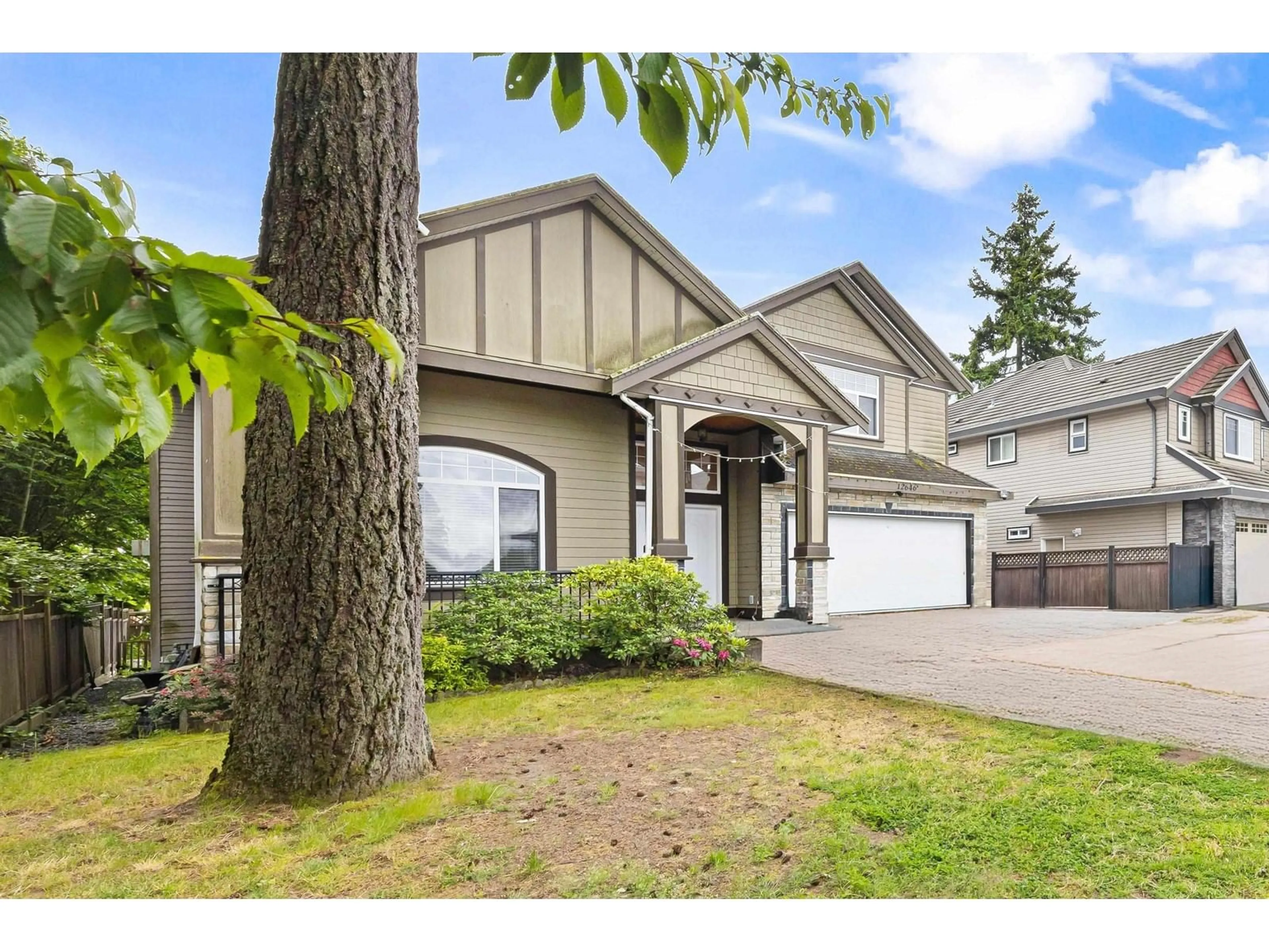 Home with vinyl exterior material, street for 12646 60A, Surrey British Columbia V3X0A7