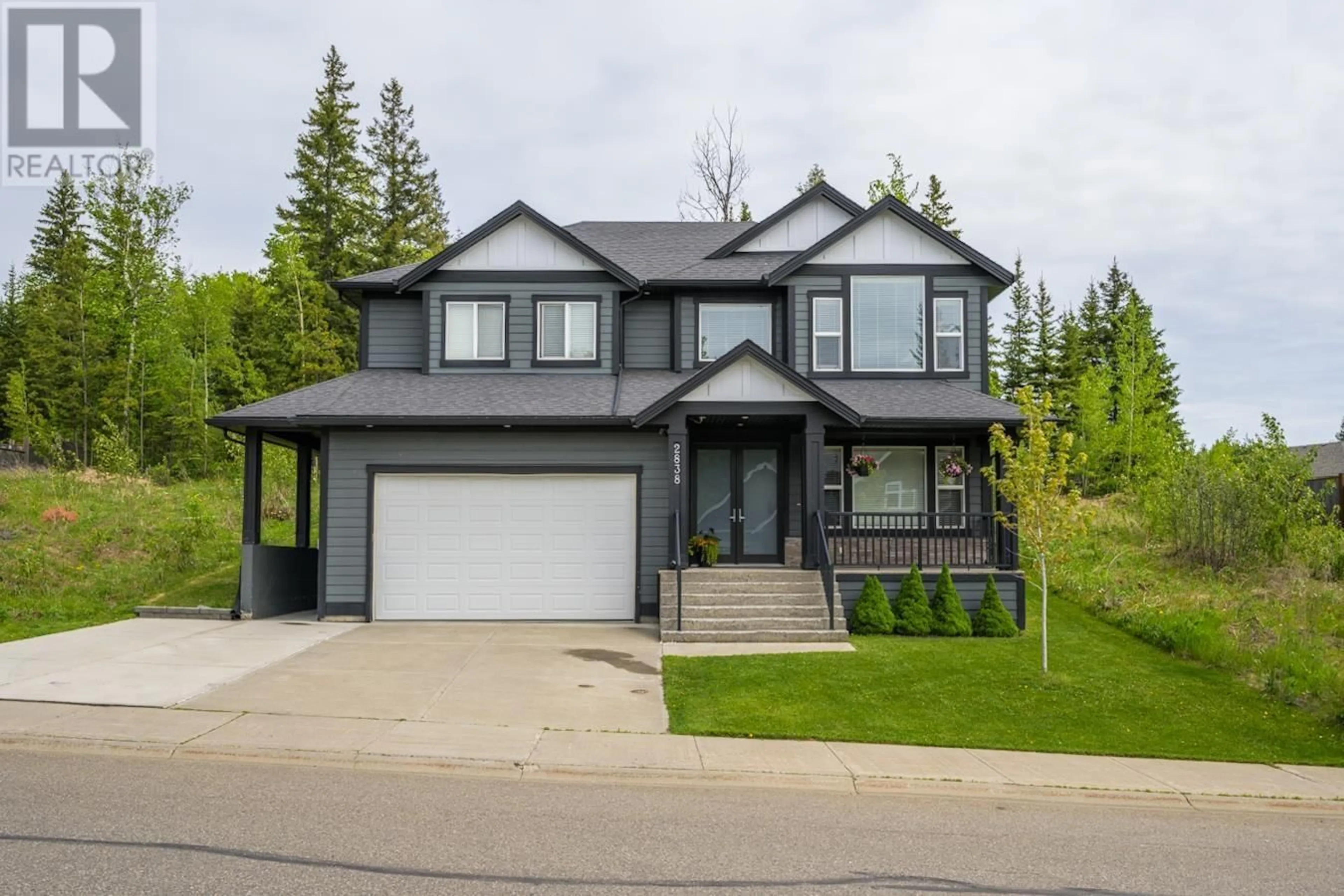 Home with vinyl exterior material, street for 2838 MAURICE DRIVE, Prince George British Columbia V2N0C8