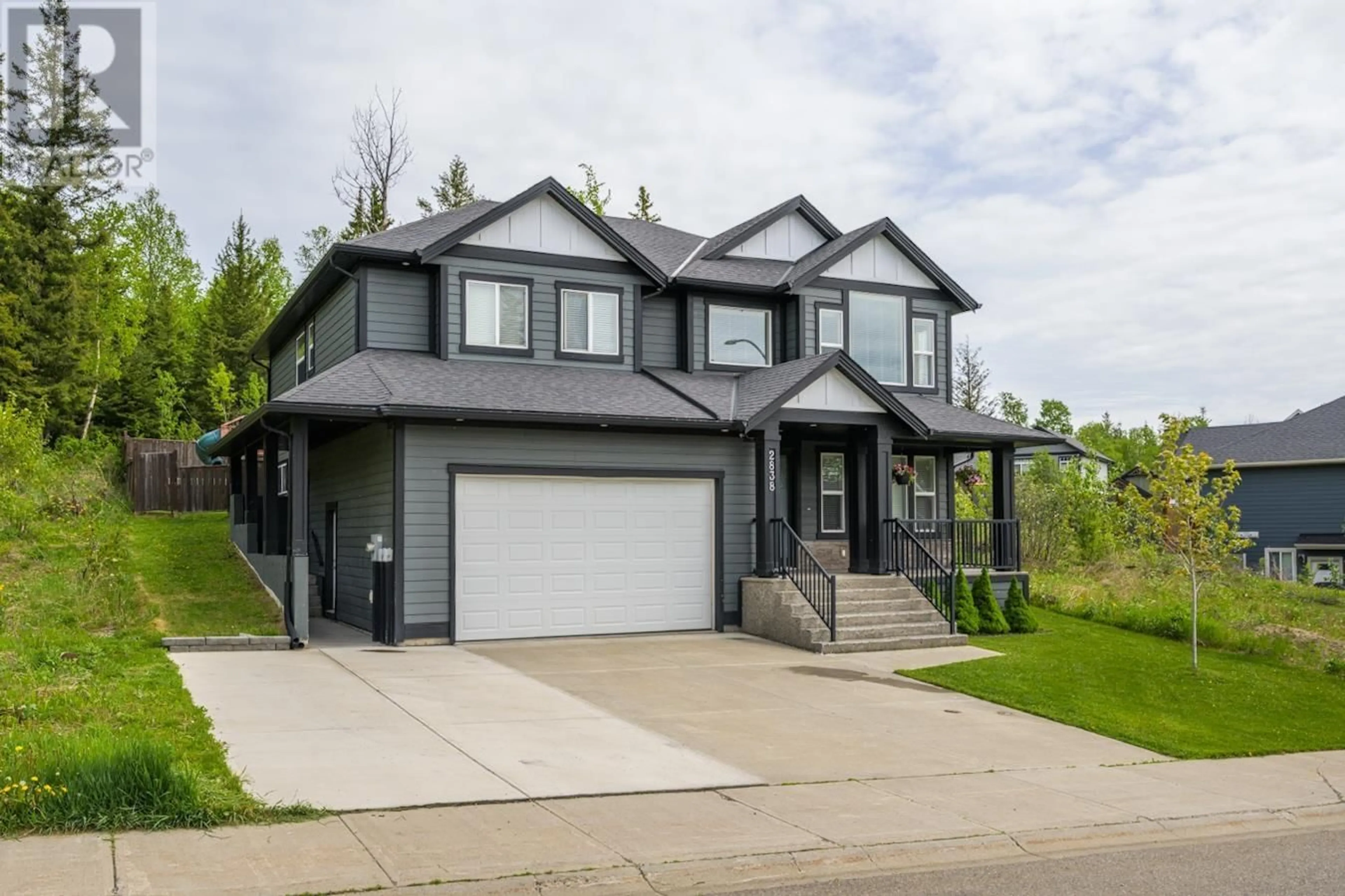 Home with vinyl exterior material, street for 2838 MAURICE DRIVE, Prince George British Columbia V2N0C8
