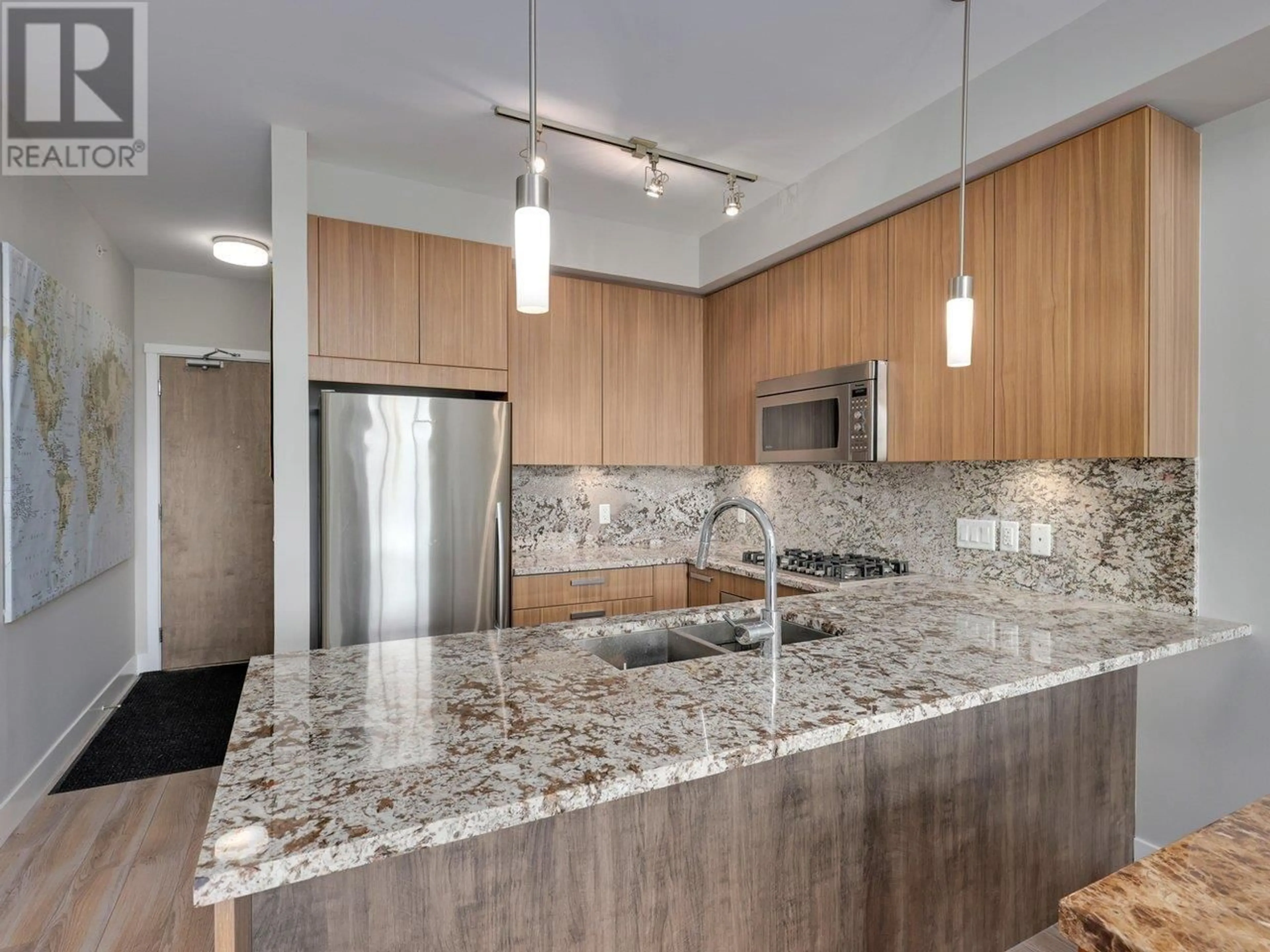 Contemporary kitchen, unknown for 409 - 4307 HASTINGS STREET, Burnaby British Columbia V5C2J7