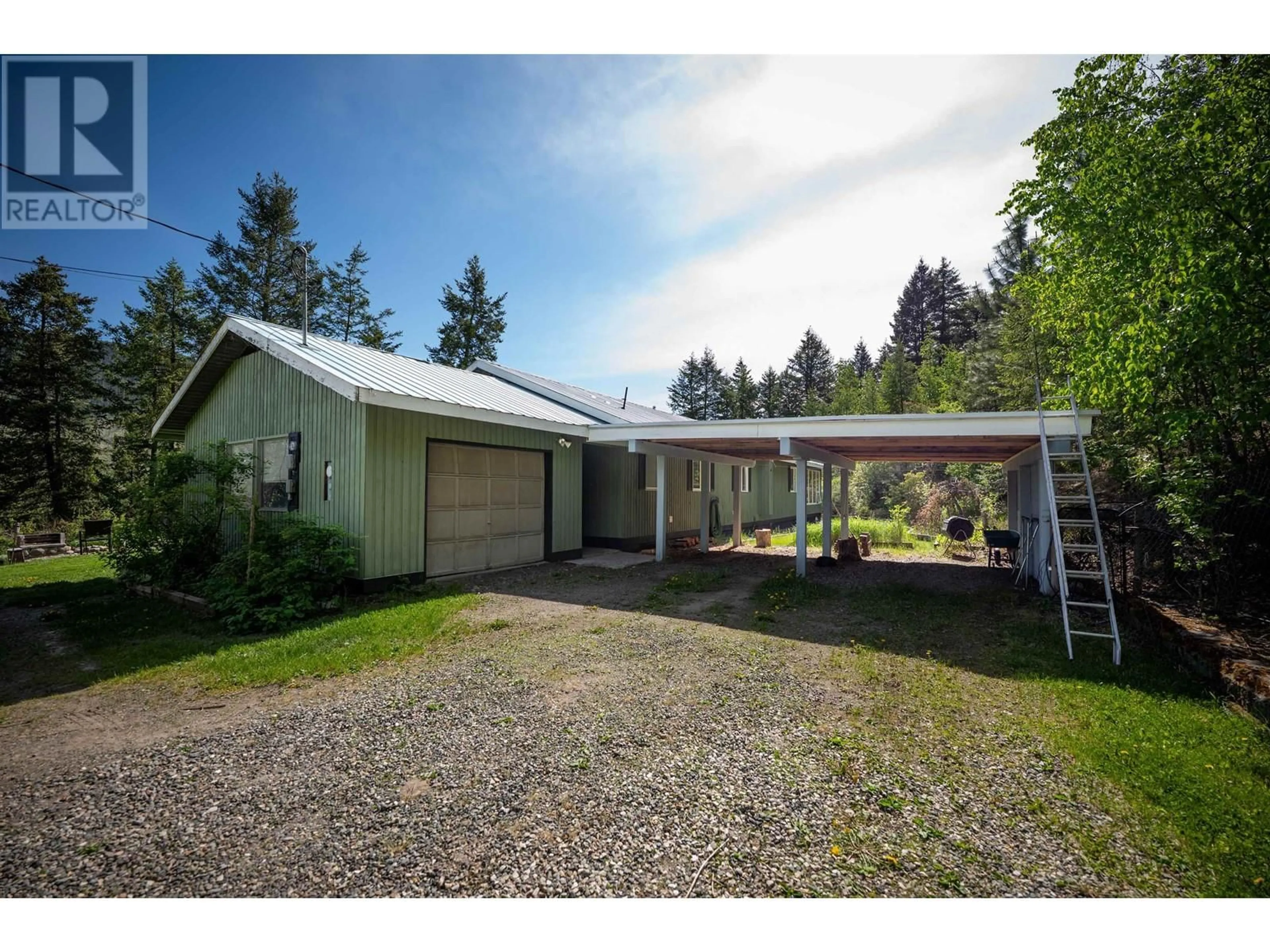 A pic from outside/outdoor area/front of a property/back of a property/a pic from drone, street for 5993 WEST FRASER ROAD, Williams Lake British Columbia V2G5H6