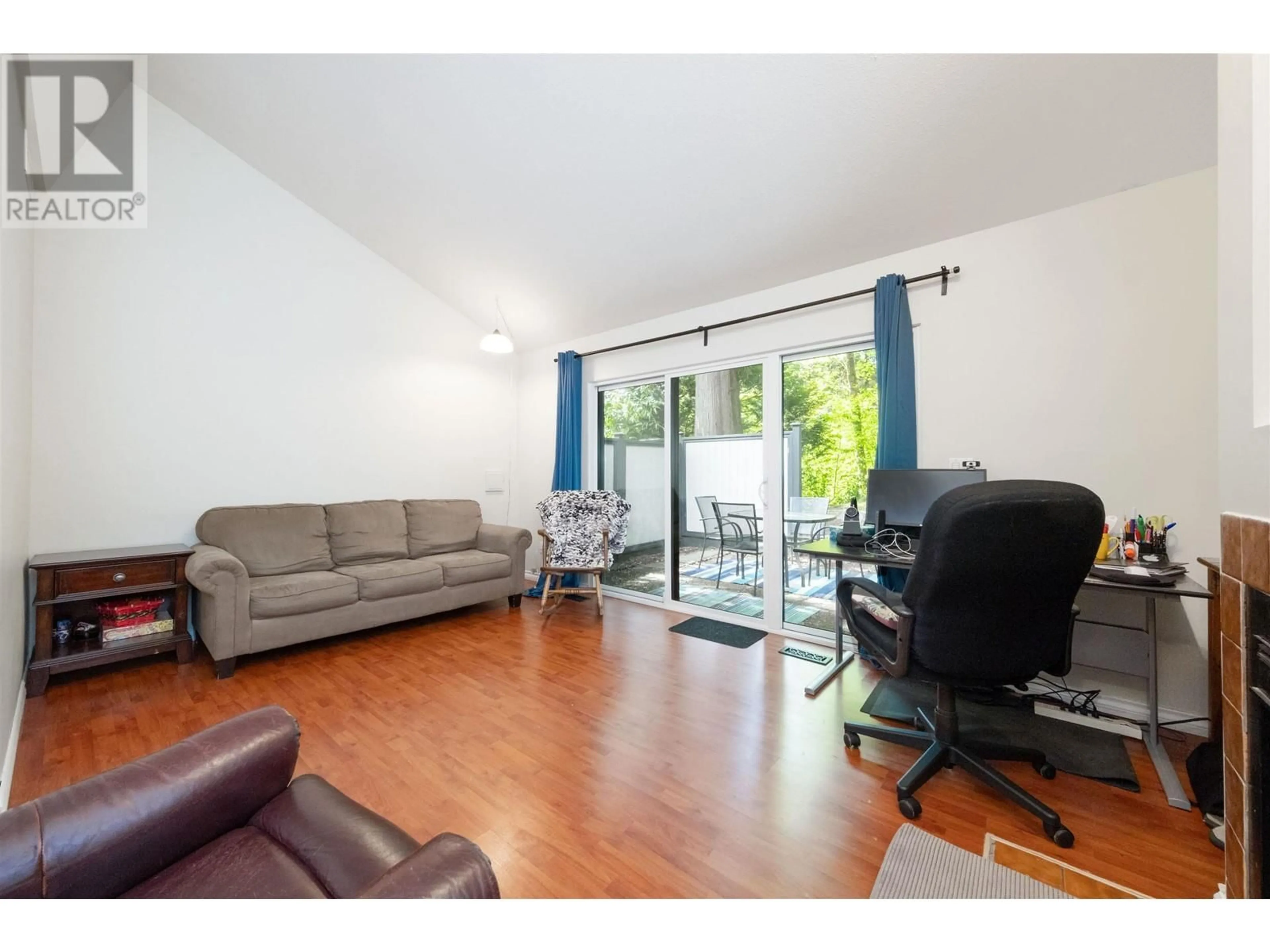 Living room with furniture, wood/laminate floor for 8511 TIMBER COURT, Burnaby British Columbia V5A4B6