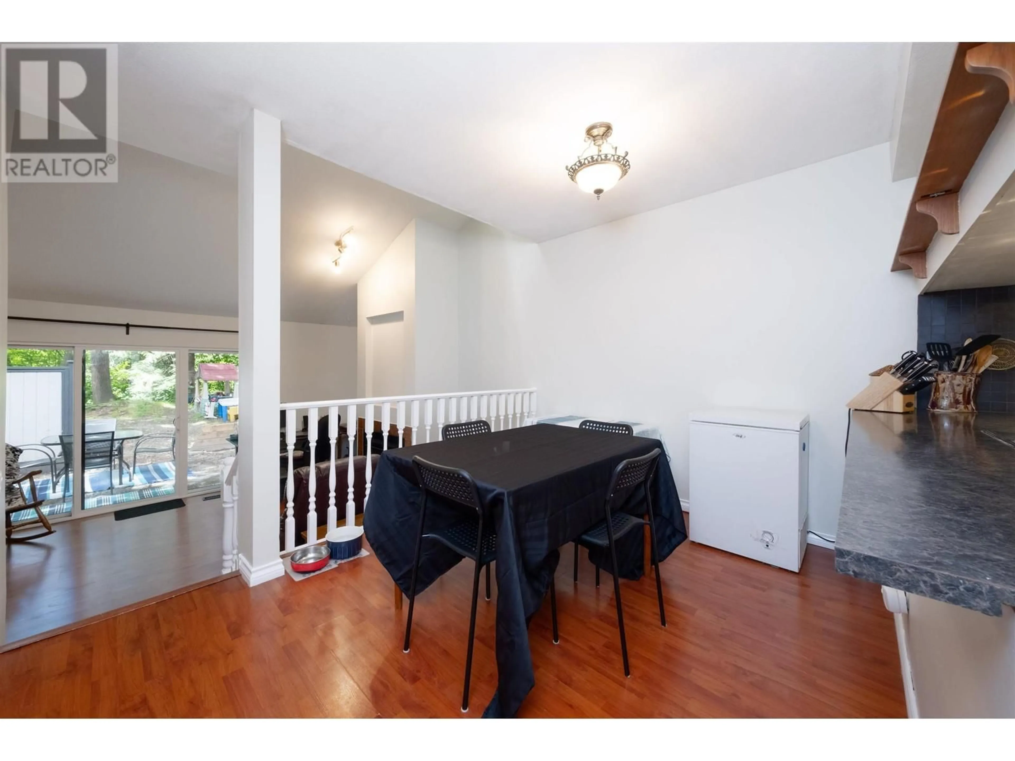 Dining room, wood/laminate floor for 8511 TIMBER COURT, Burnaby British Columbia V5A4B6