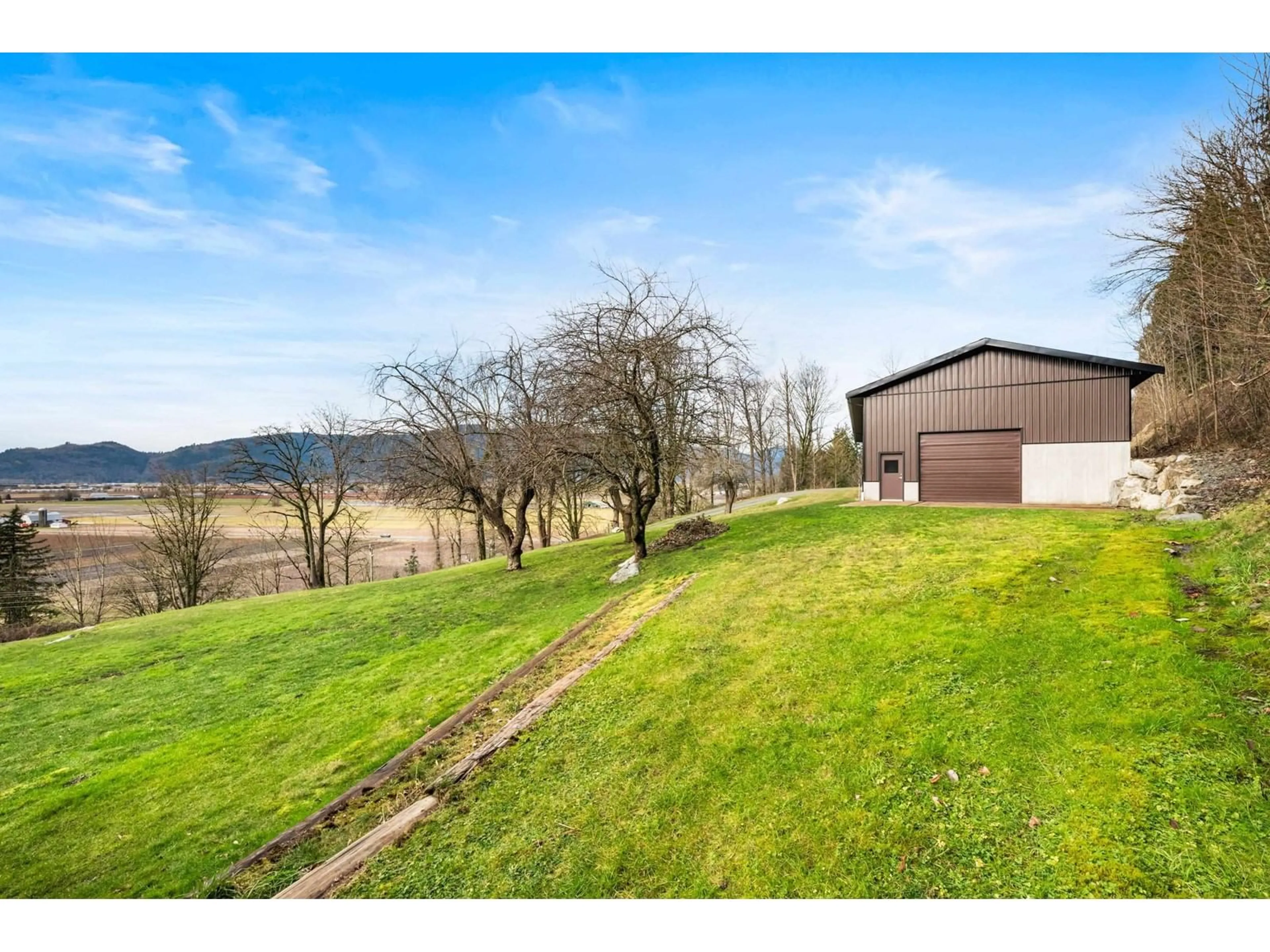 A pic from outside/outdoor area/front of a property/back of a property/a pic from drone, water/lake/river/ocean view for 2220 TOLMIE, Abbotsford British Columbia V3G2S9