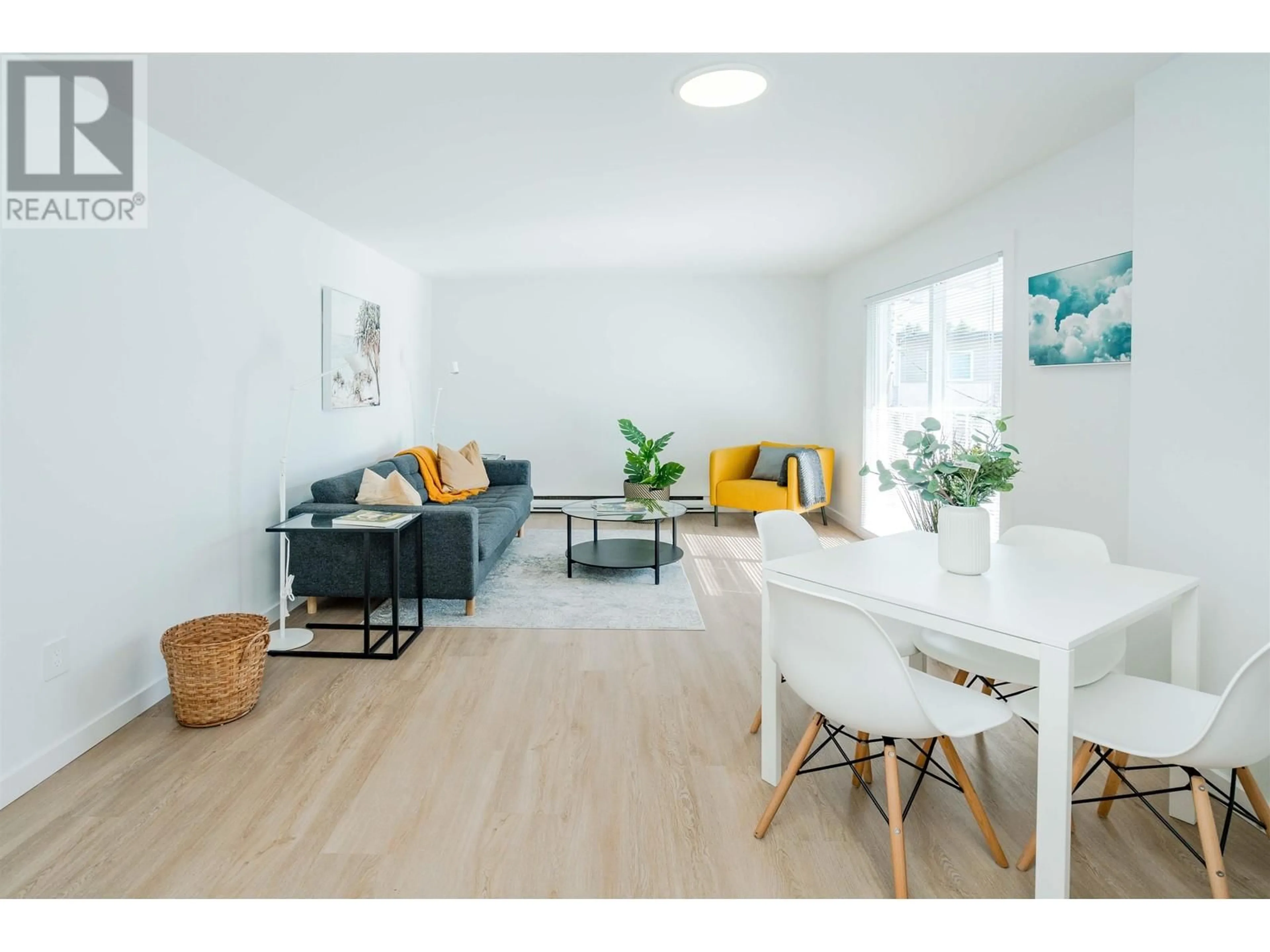 Living room with furniture, wood/laminate floor for 302 - 8690 MONTCALM STREET, Vancouver British Columbia V6P4P8