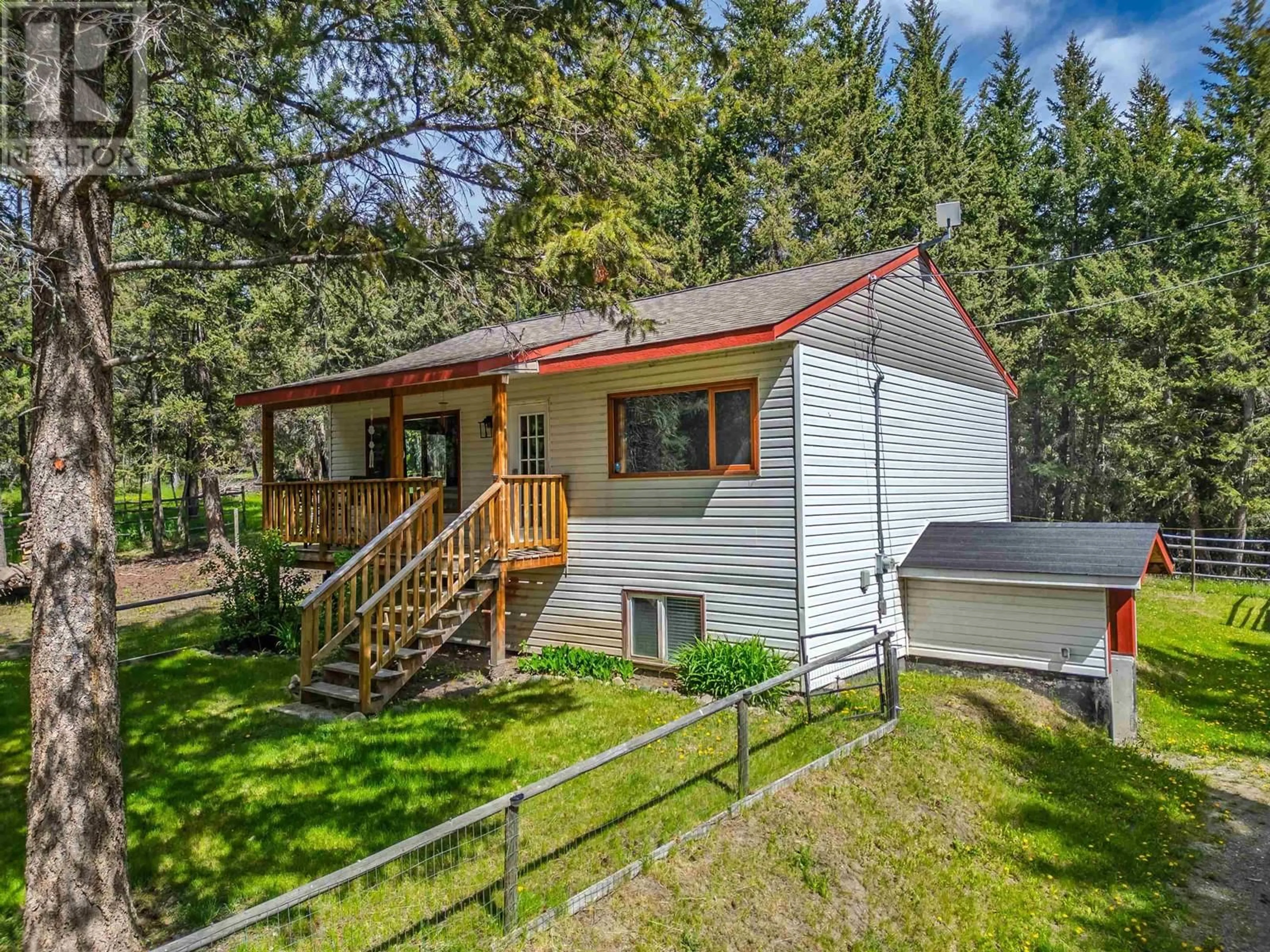 A pic from outside/outdoor area/front of a property/back of a property/a pic from drone, unknown for 4919 LATHAM ROAD, 100 Mile House British Columbia V0K2E1