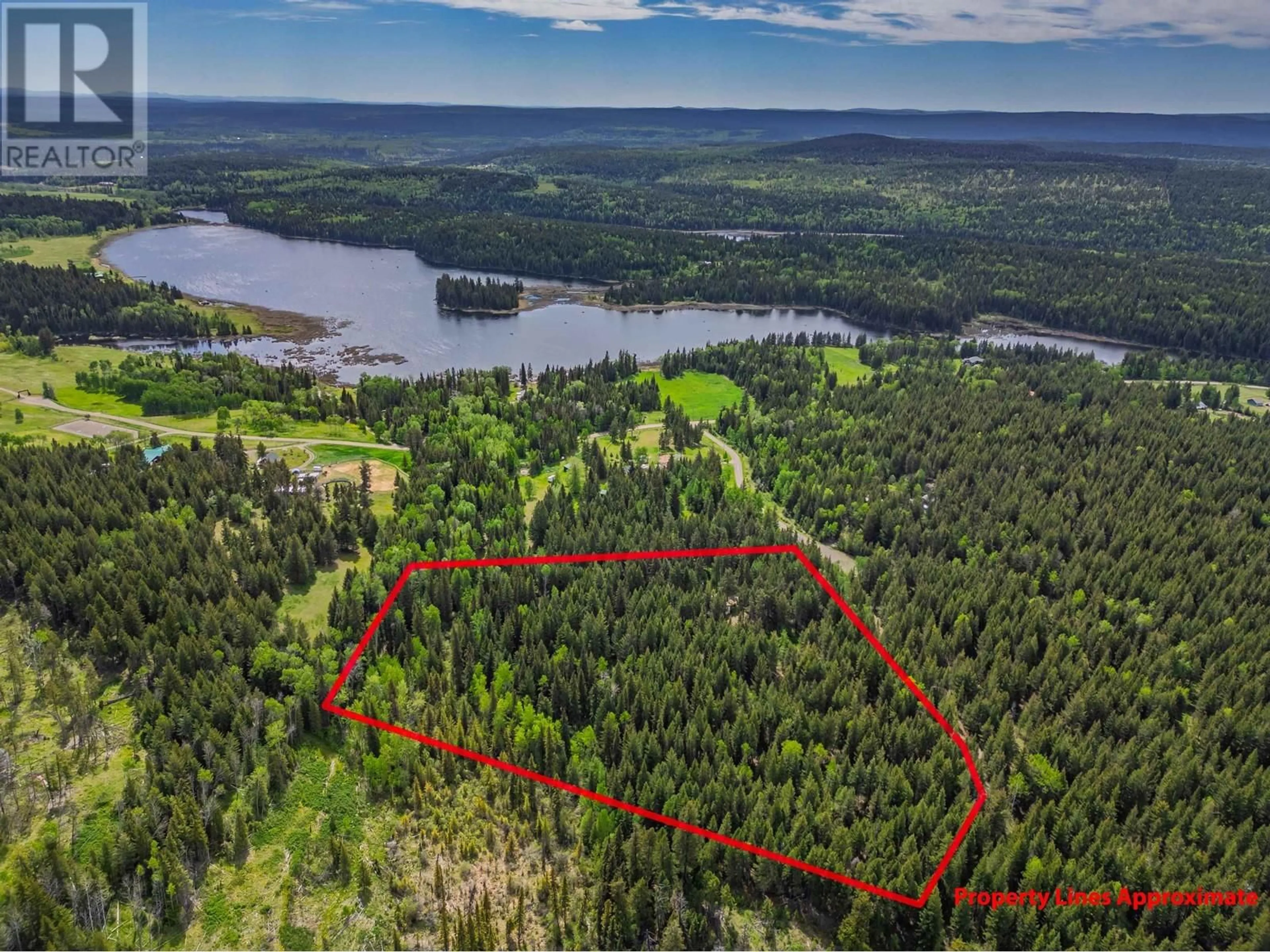 A pic from outside/outdoor area/front of a property/back of a property/a pic from drone, water/lake/river/ocean view for 4919 LATHAM ROAD, 100 Mile House British Columbia V0K2E1