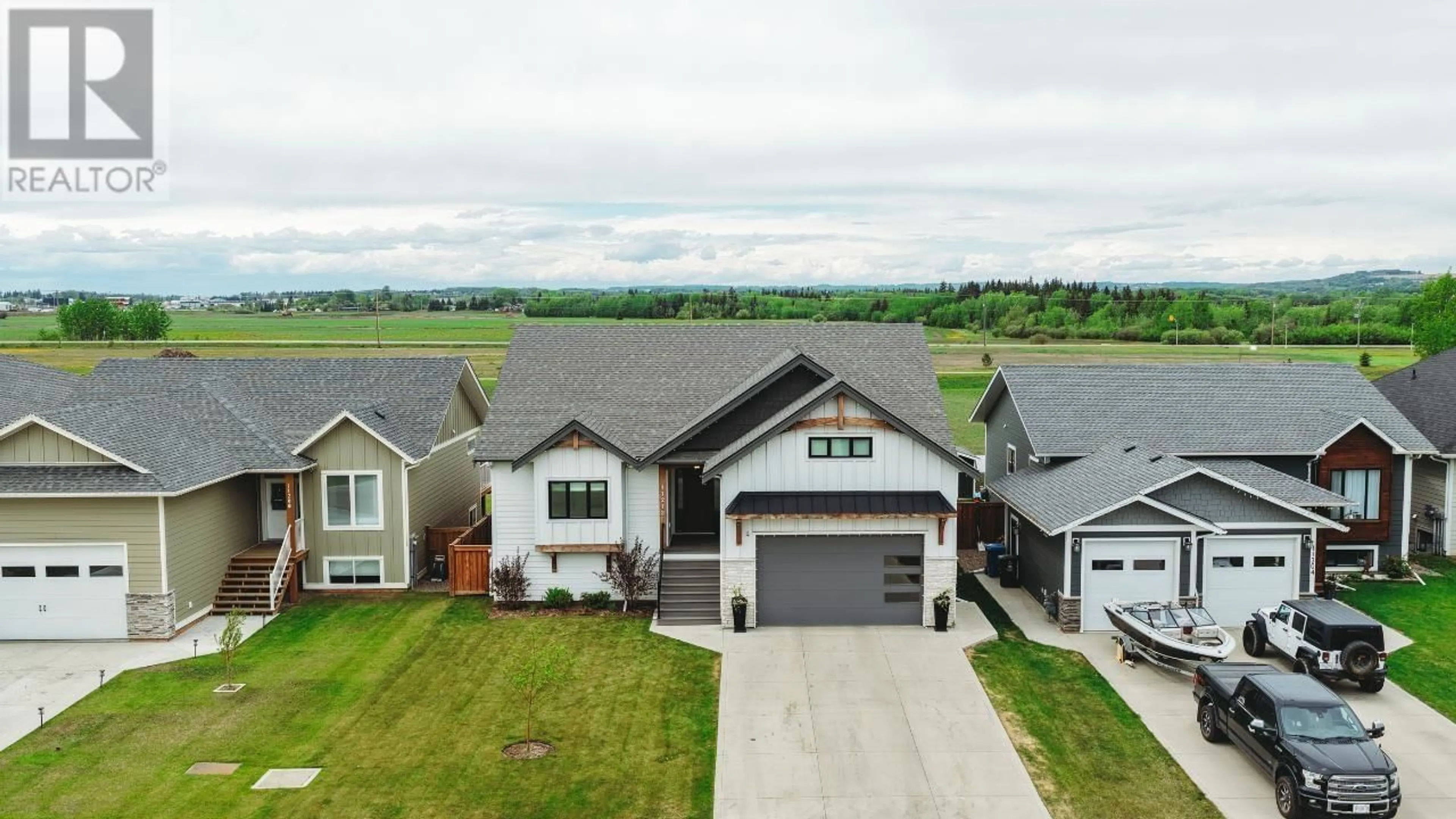 A pic from outside/outdoor area/front of a property/back of a property/a pic from drone, street for 11212 113 STREET, Fort St. John British Columbia V1J0R5