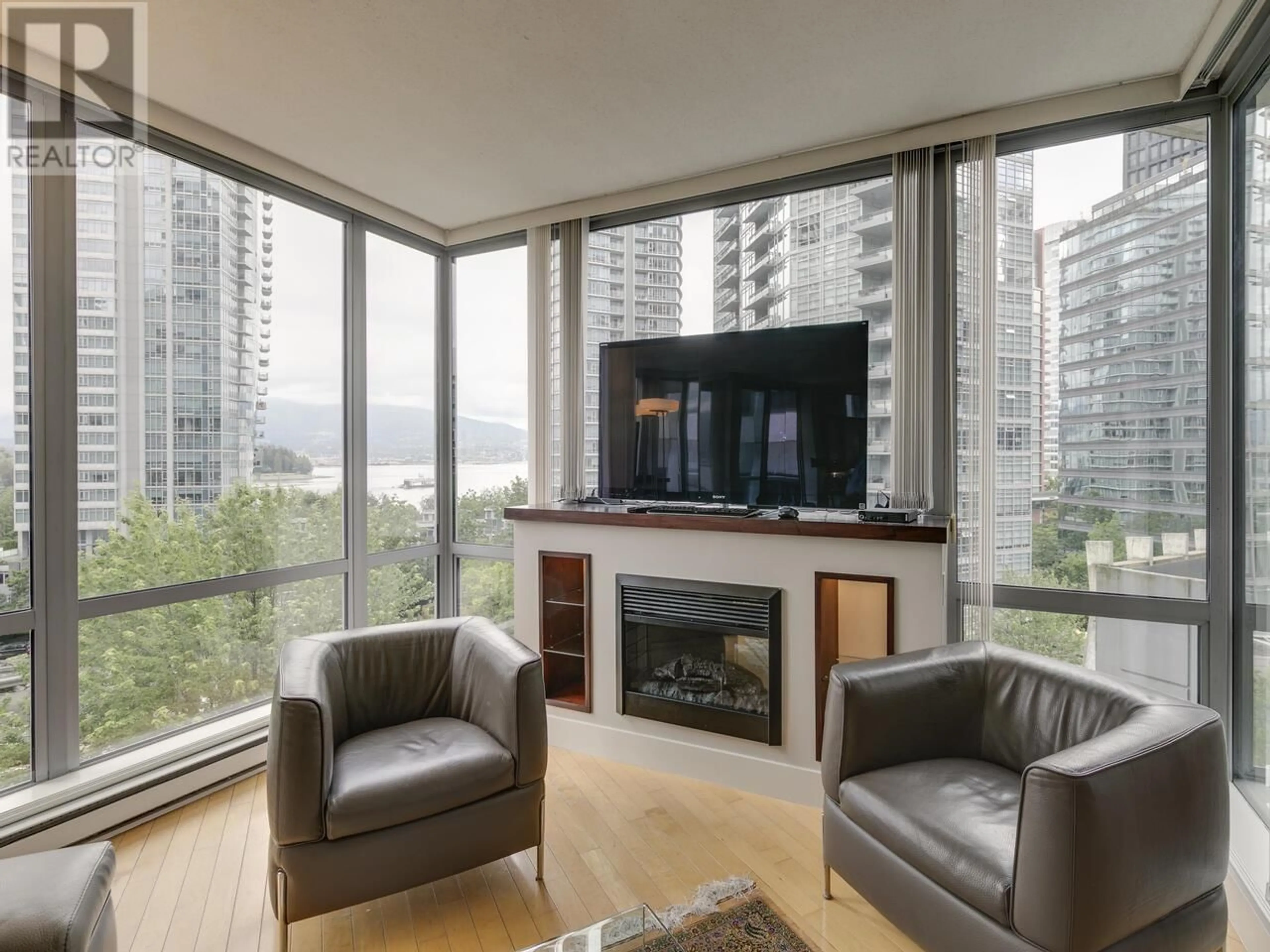 Living room with furniture, wood/laminate floor for 601 - 1228 HASTINGS STREET, Vancouver British Columbia V6E4S6