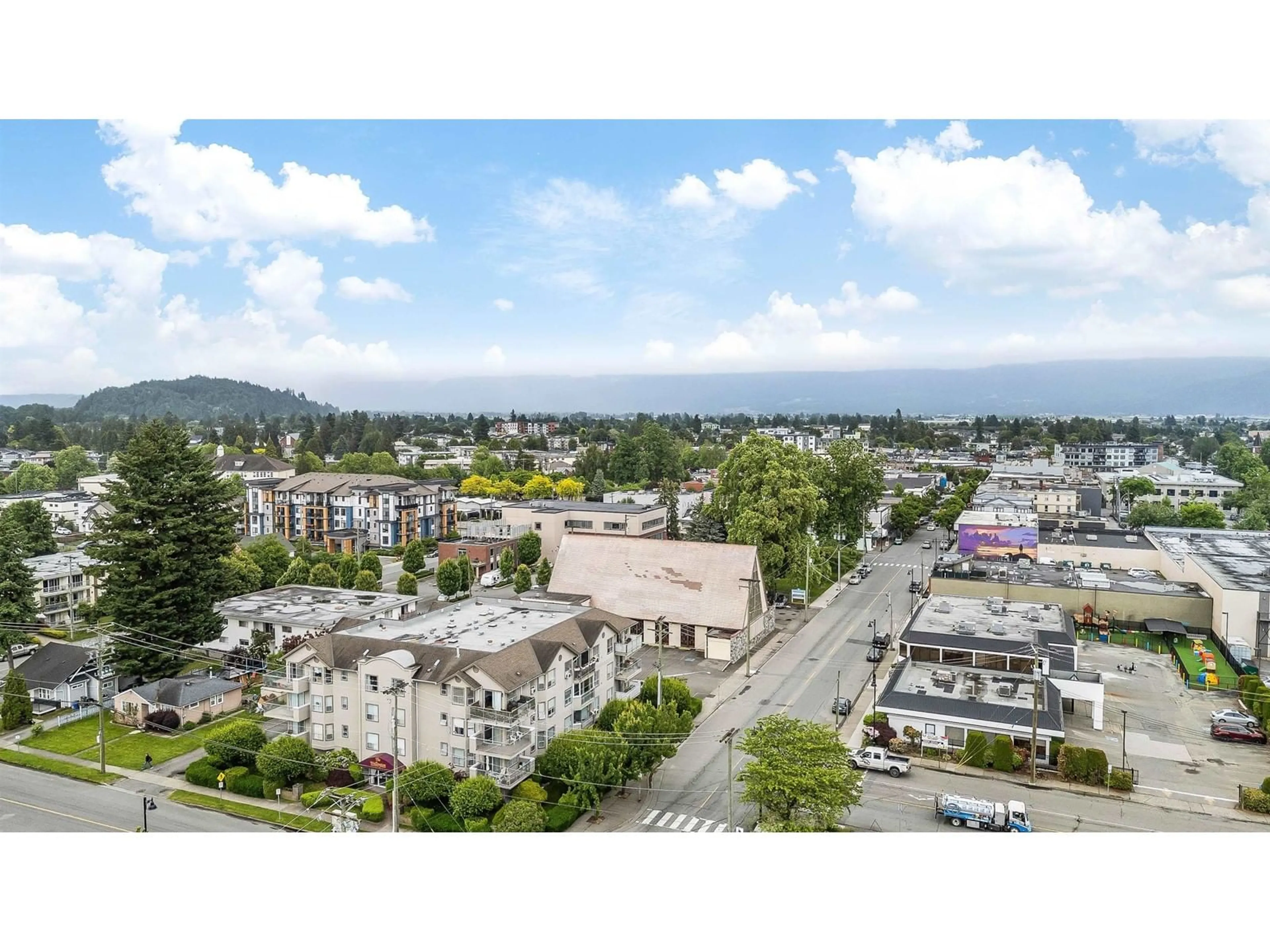A pic from outside/outdoor area/front of a property/back of a property/a pic from drone, mountain view for 204 - 9400 COOK STREET, Chilliwack British Columbia V2P4J6
