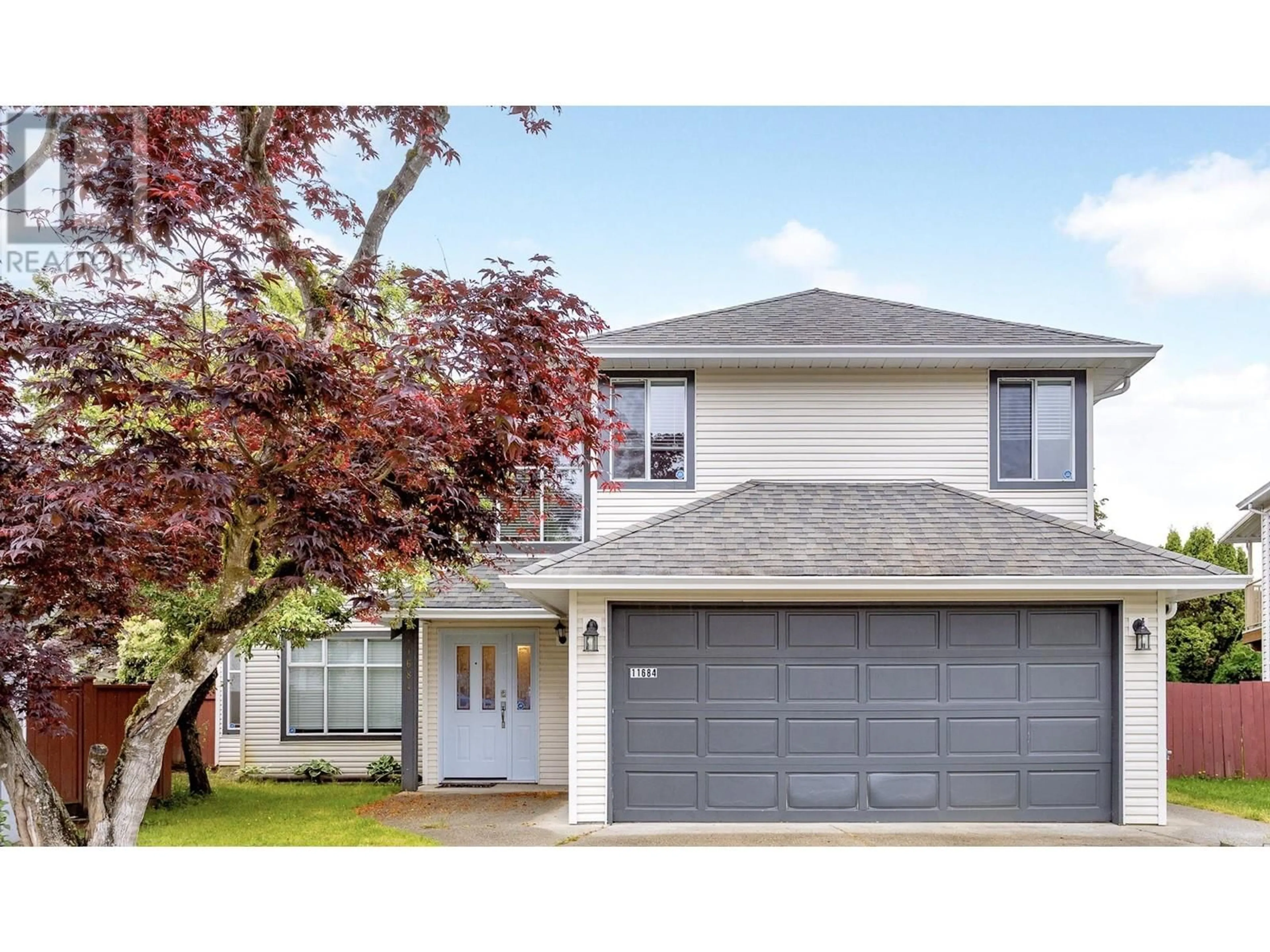 Home with vinyl exterior material, street for 11684 206A STREET, Maple Ridge British Columbia V2X0X8