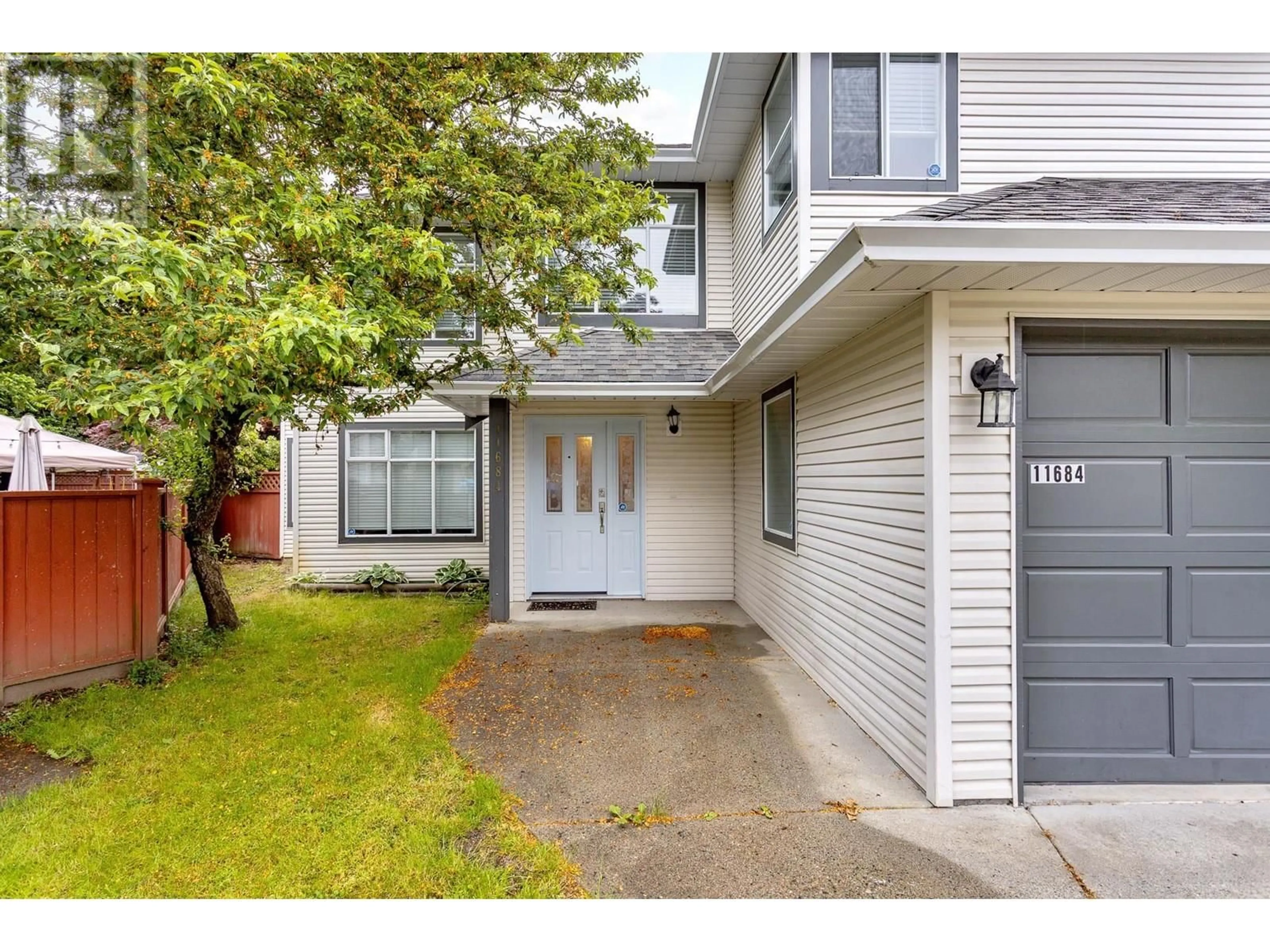 Home with vinyl exterior material, street for 11684 206A STREET, Maple Ridge British Columbia V2X0X8