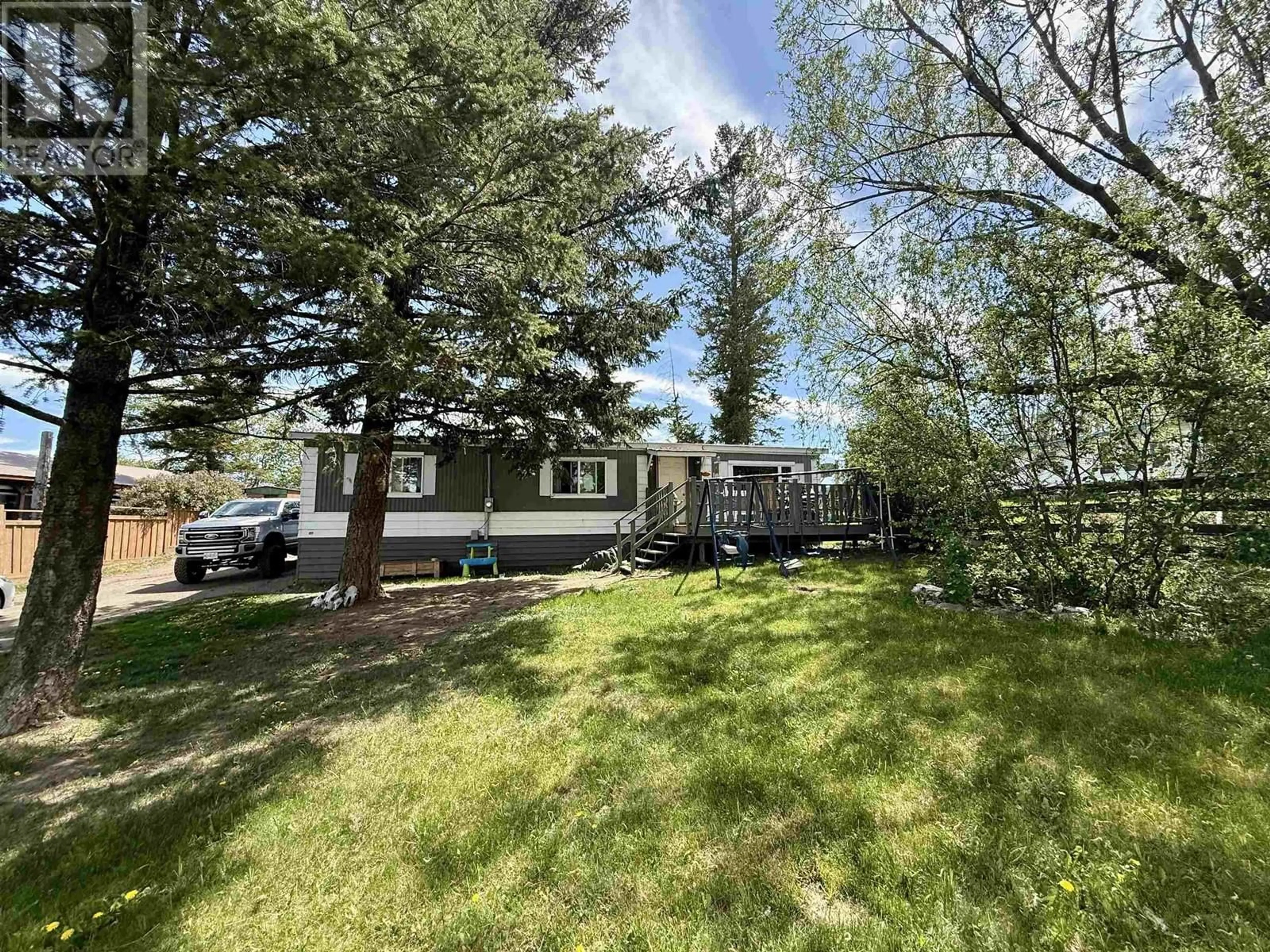 A pic from outside/outdoor area/front of a property/back of a property/a pic from drone, unknown for 5586 103 MILE LAKE ROAD, 103 Mile House British Columbia V0K2E1