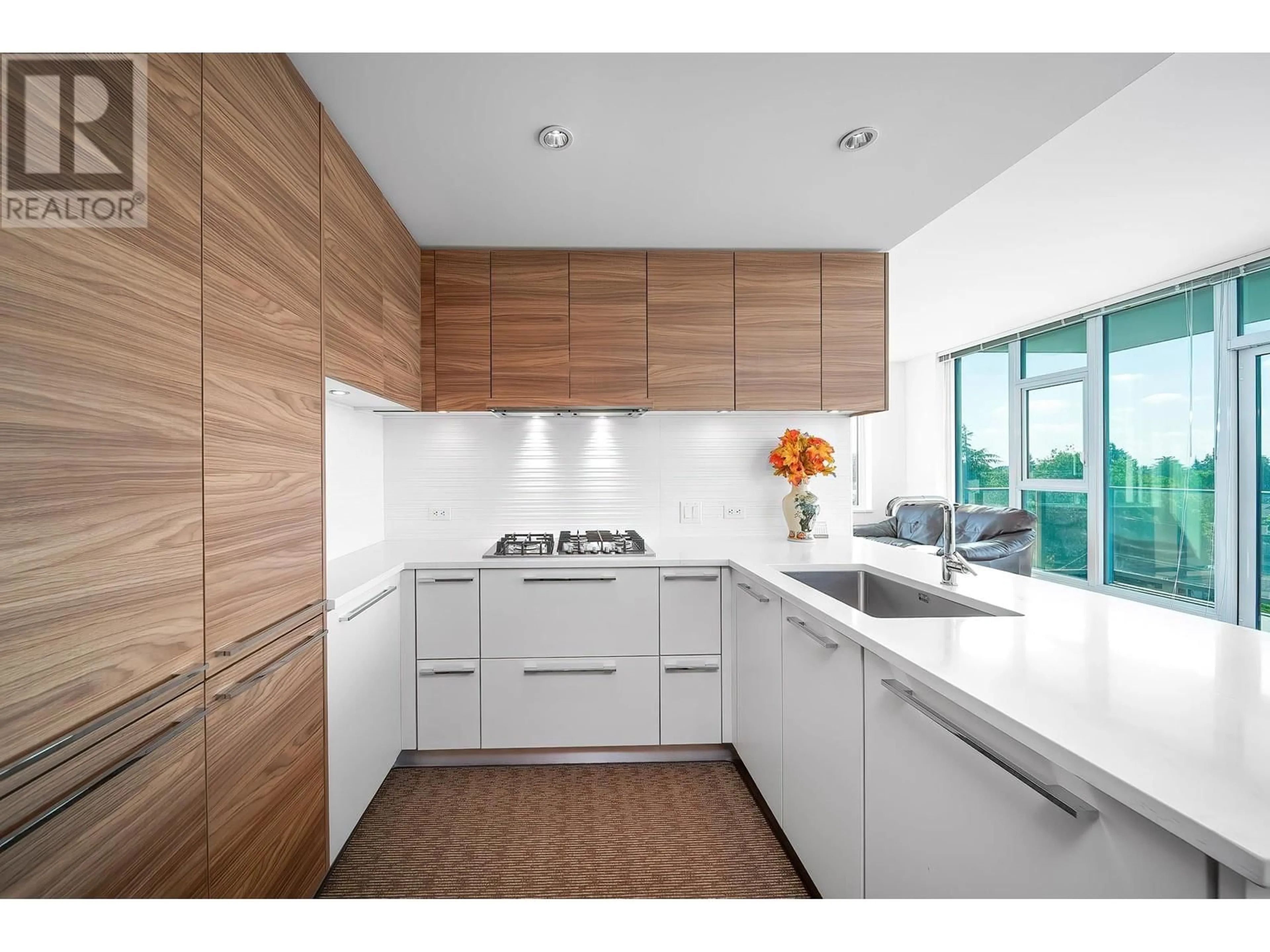 Contemporary kitchen, wood/laminate floor for 608 - 7303 NOBLE LANE, Burnaby British Columbia V3N0H2