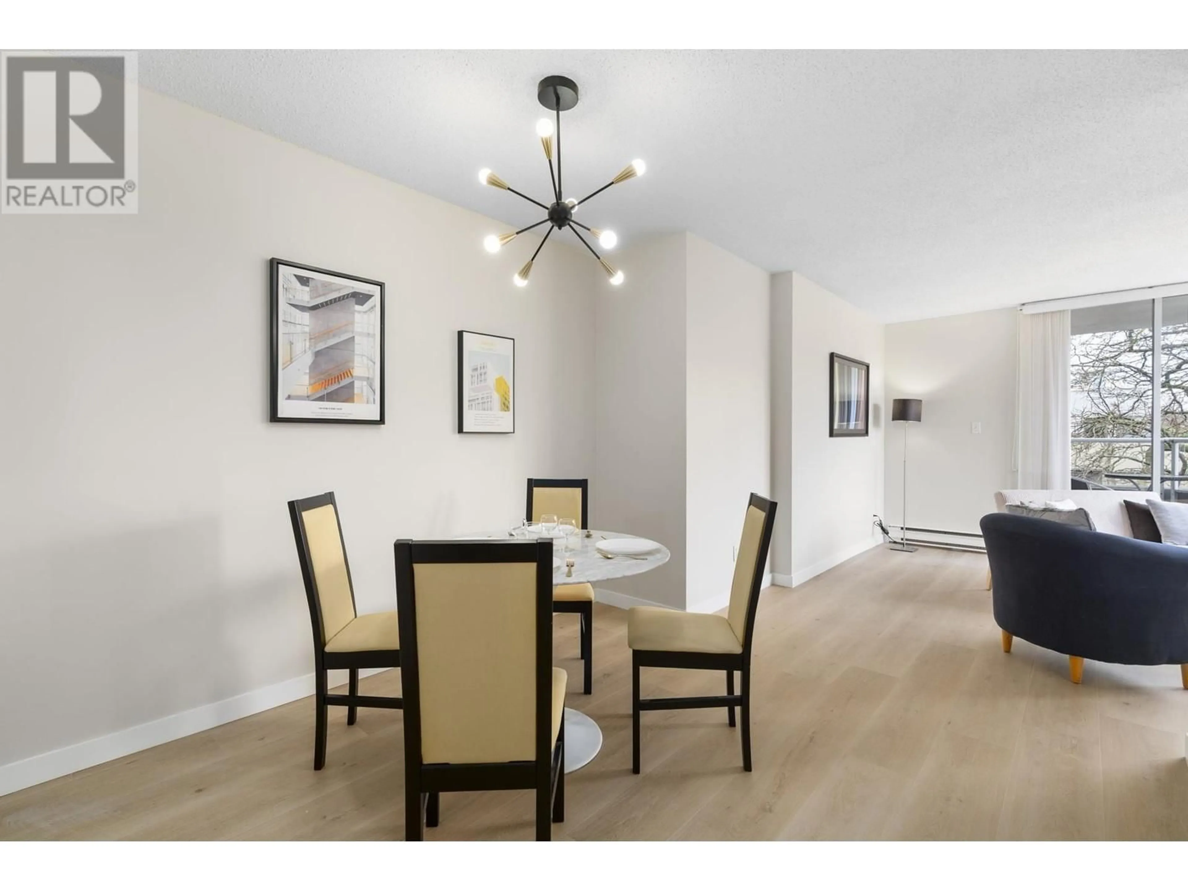 Dining room, wood/laminate floor for 301 - 1771 NELSON STREET, Vancouver British Columbia V6G1M6