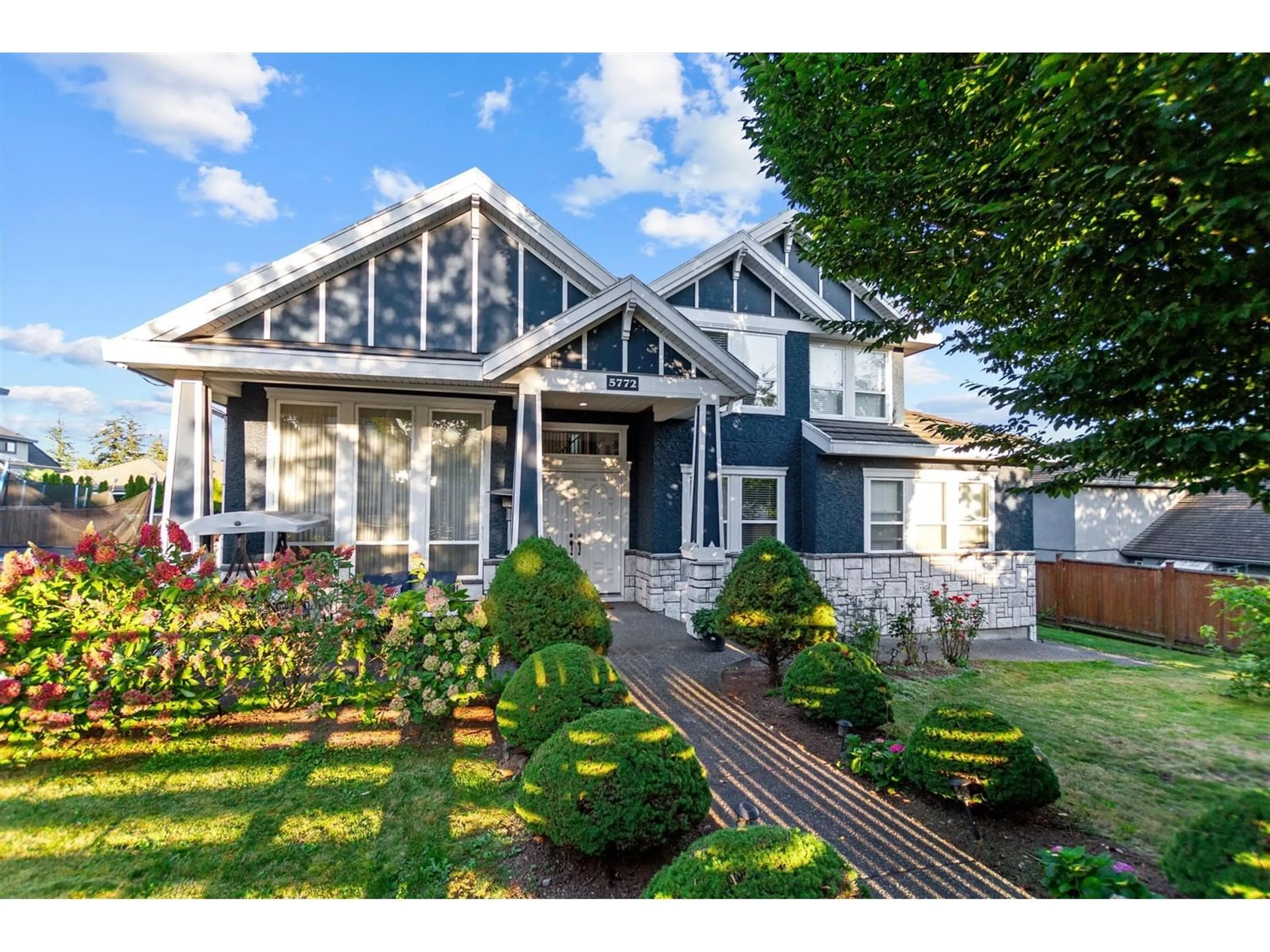 Home with vinyl exterior material, street for 5772 152, Surrey British Columbia V3S3K2