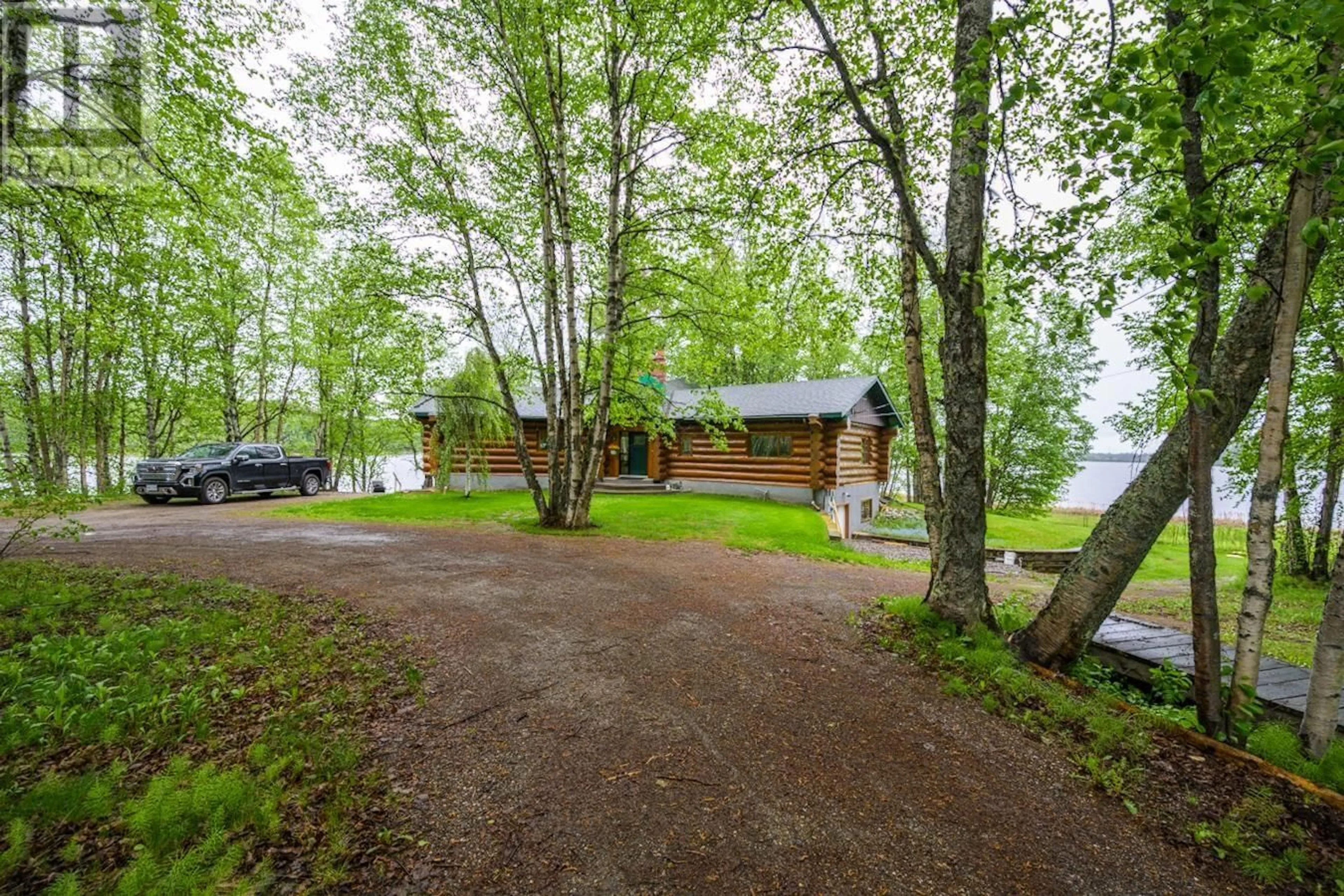 A pic from outside/outdoor area/front of a property/back of a property/a pic from drone, water/lake/river/ocean view for 14420 NUKKO LAKE ESTATES ROAD, Prince George British Columbia V2K5K6